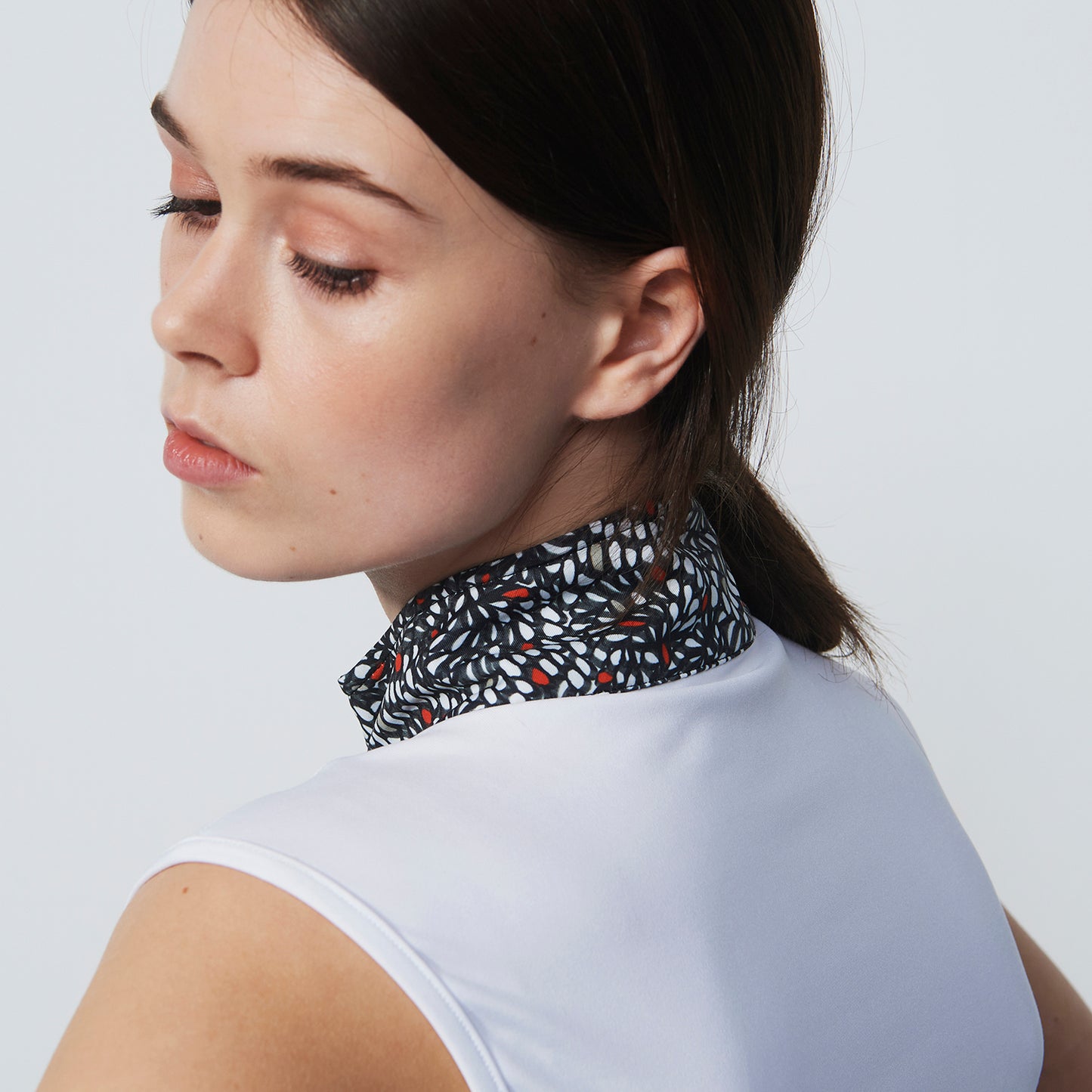 Daily Sports Ladies Sleeveless Zip-Neck Polo Shirt in White