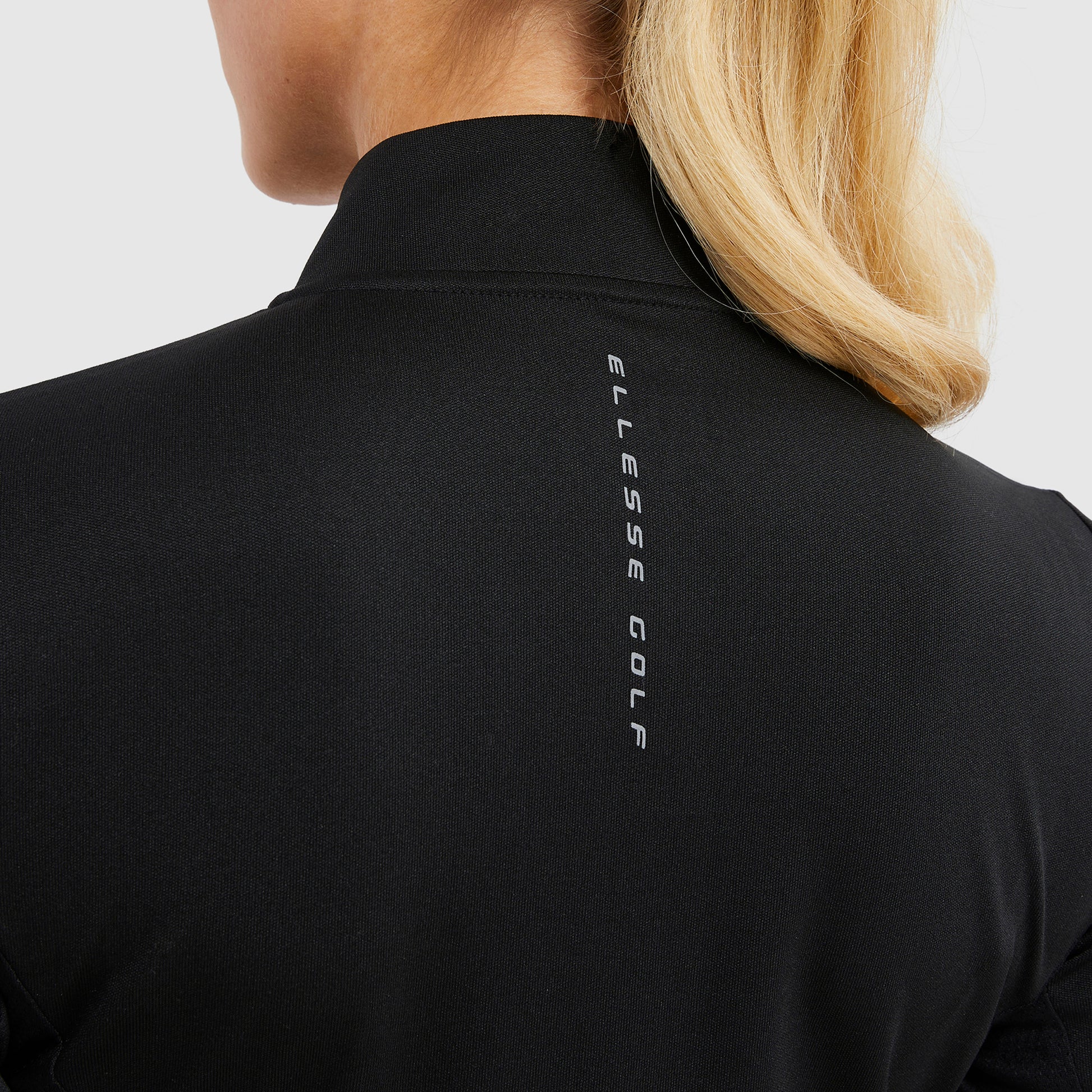 Ellesse Ladies Zip-Neck Top in Black with Mesh Panel Detail
