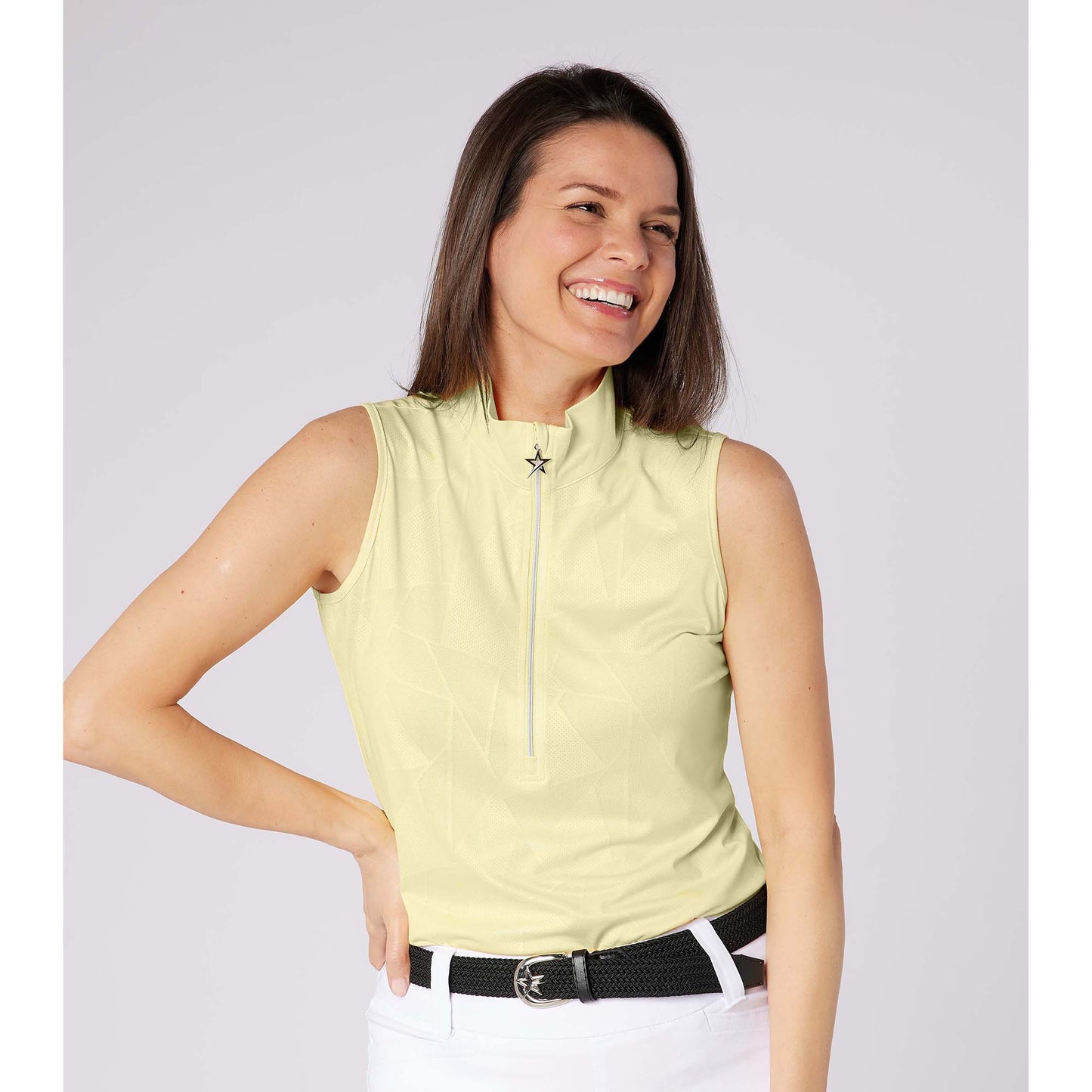 Swing Out Sister Elegant Embossed Ladies Sleeveless Polo with Zip Neck β A Stylish Staple for Every Season