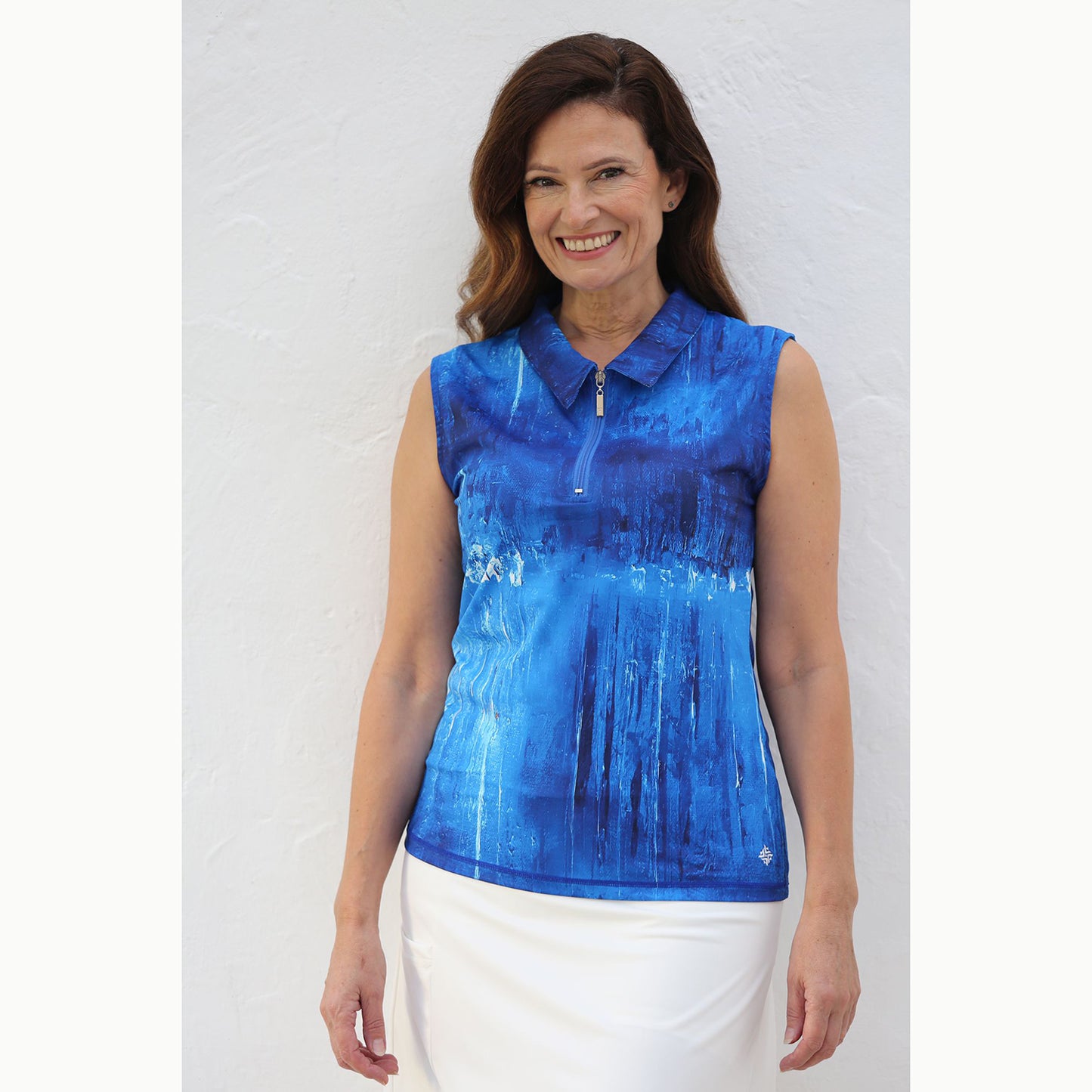 FAMARA Ladies Sleeveless Polo in Abstract Harbourside Print in Blue Lagoon