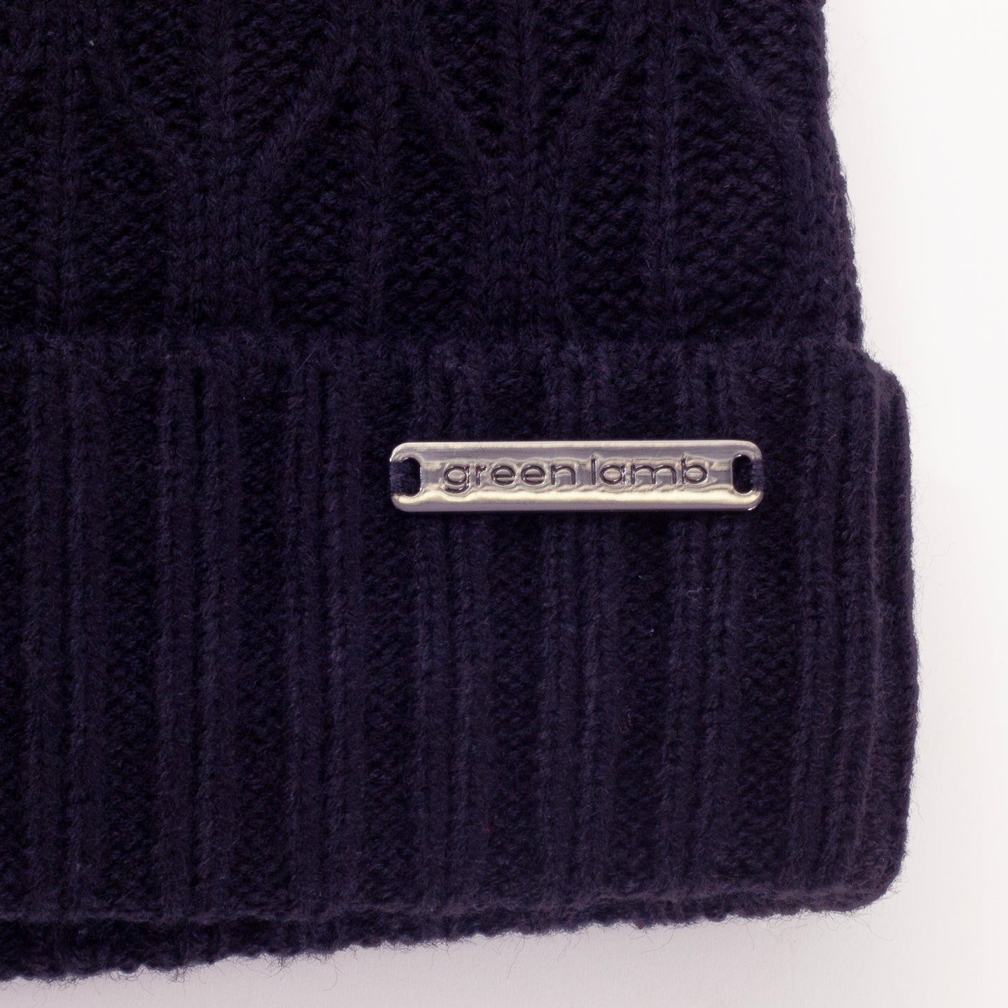 Green Lamb Ladies Fleece Lined Cable Knit Bobble Hat in Navy