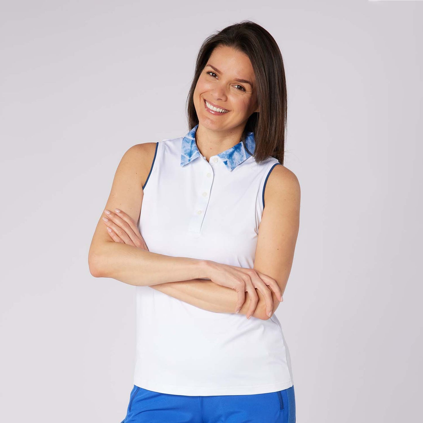 Swing Out Sister Ladies Sleeveless Polo with Subtle Print Accents for Effortless Everyday Style