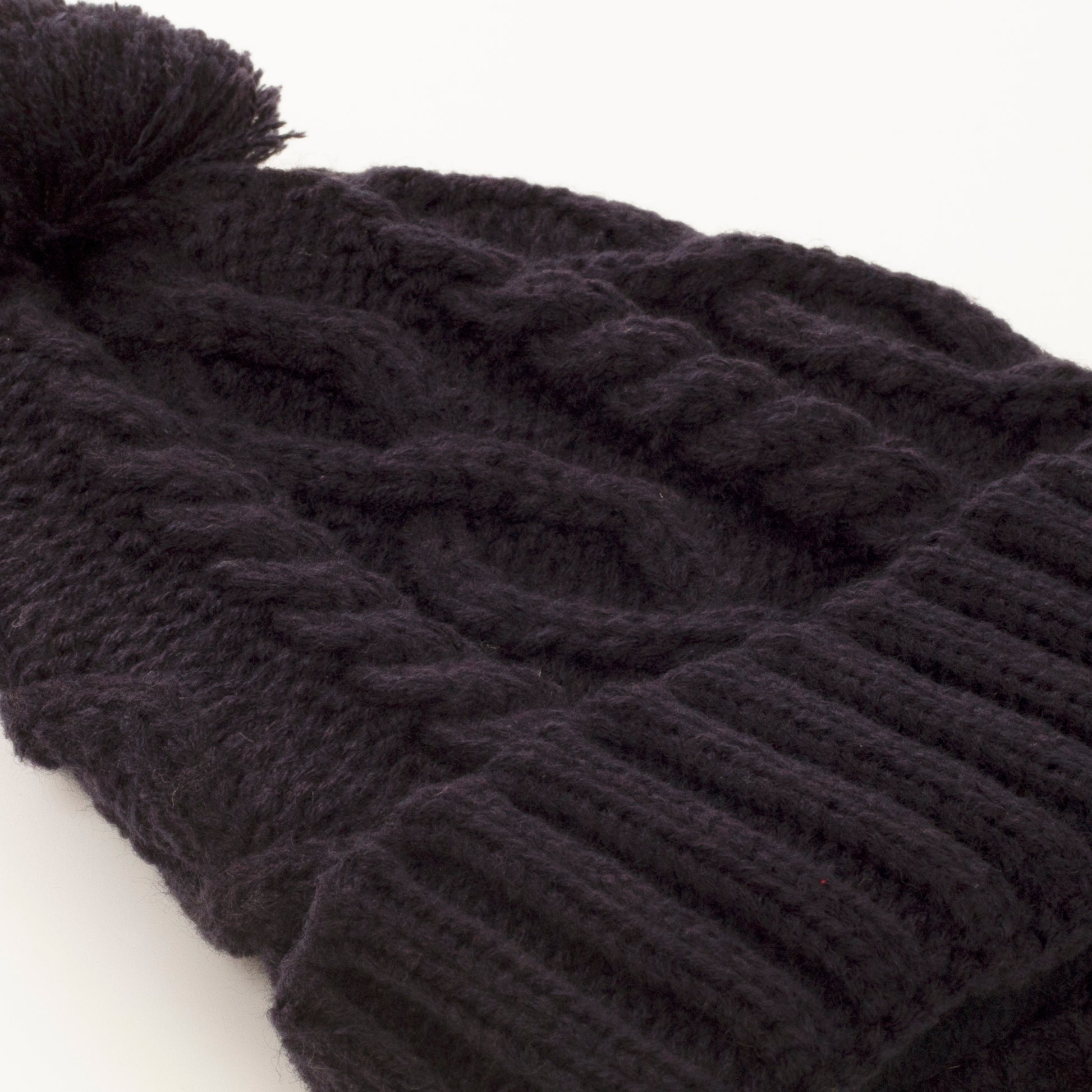 Green Lamb Ladies Krista Fleece Lined Cable Hat with Pom Pom in Black