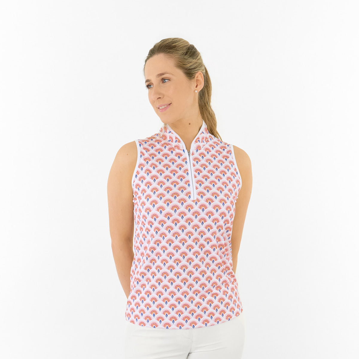 Pure Golf Ladies Sleeveless Polo in Rainbow Geo Print – Dynamic Design Meets Effortless Performance