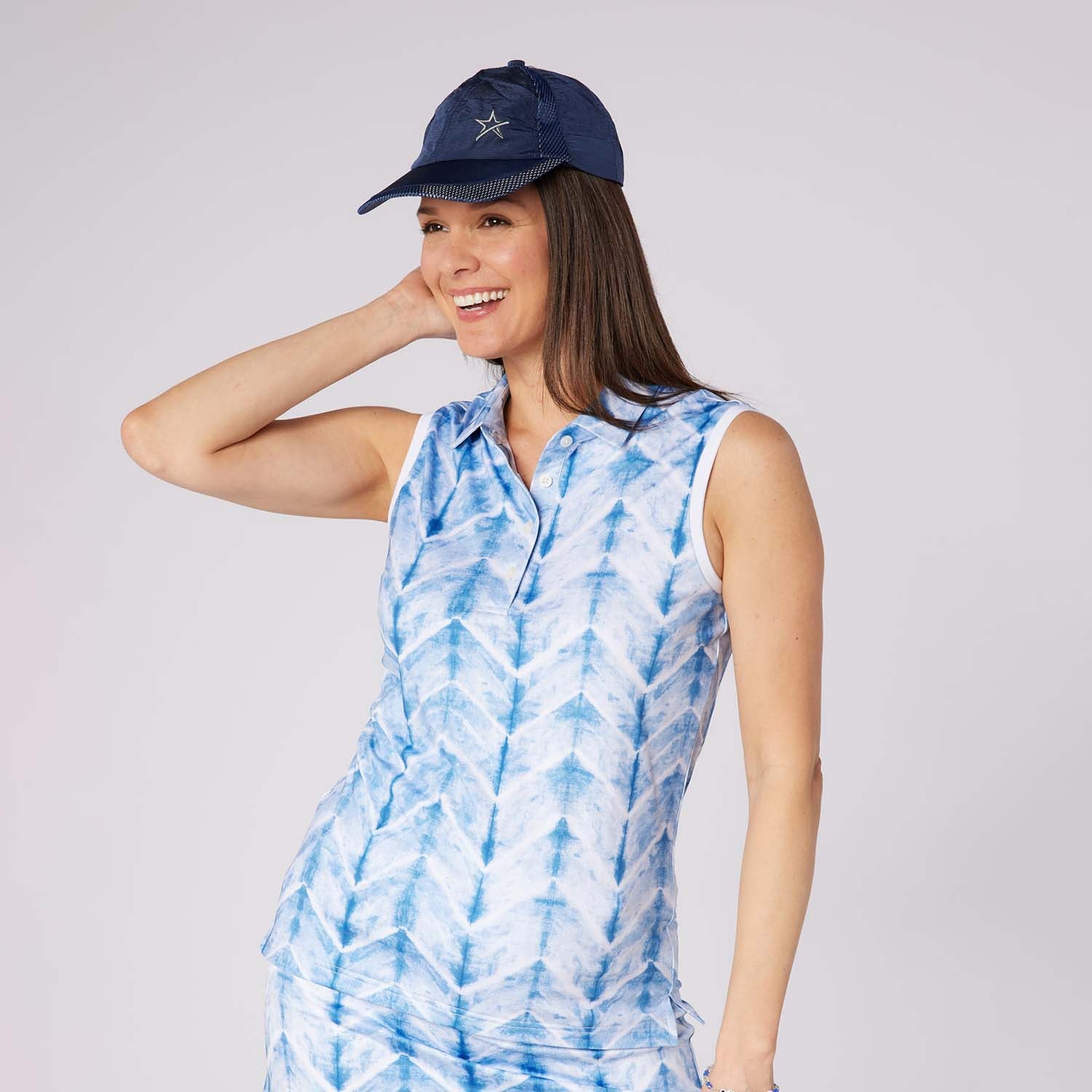 Swing Out Sister Ladies Ultra-Soft Sleeveless Polo with Head Turning Print & Stylish Contrast Trim