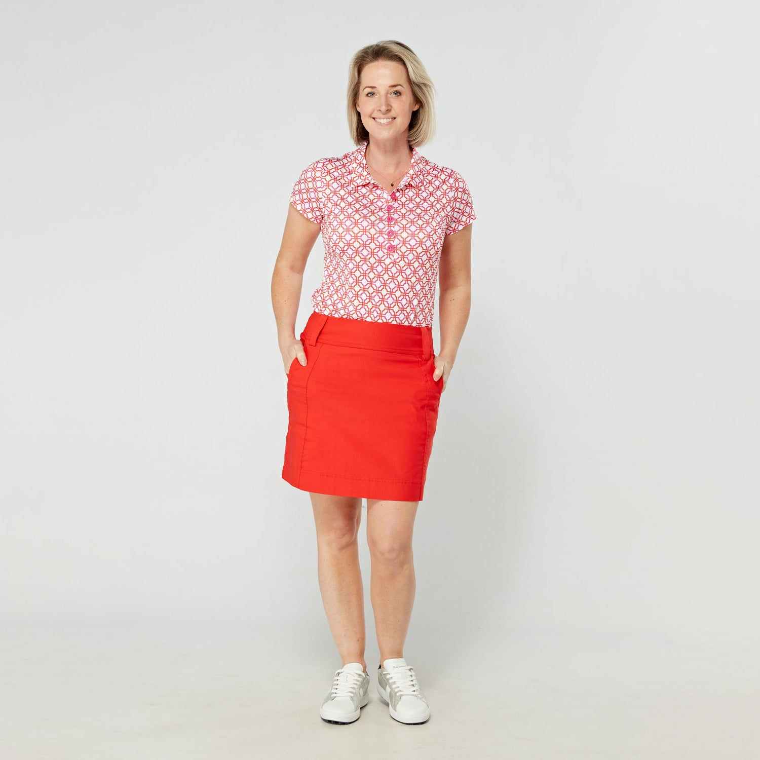 Swing Out Sister Ladies Cap Sleeve Polo in Lush Pink and Mandarin Mosaic Pattern