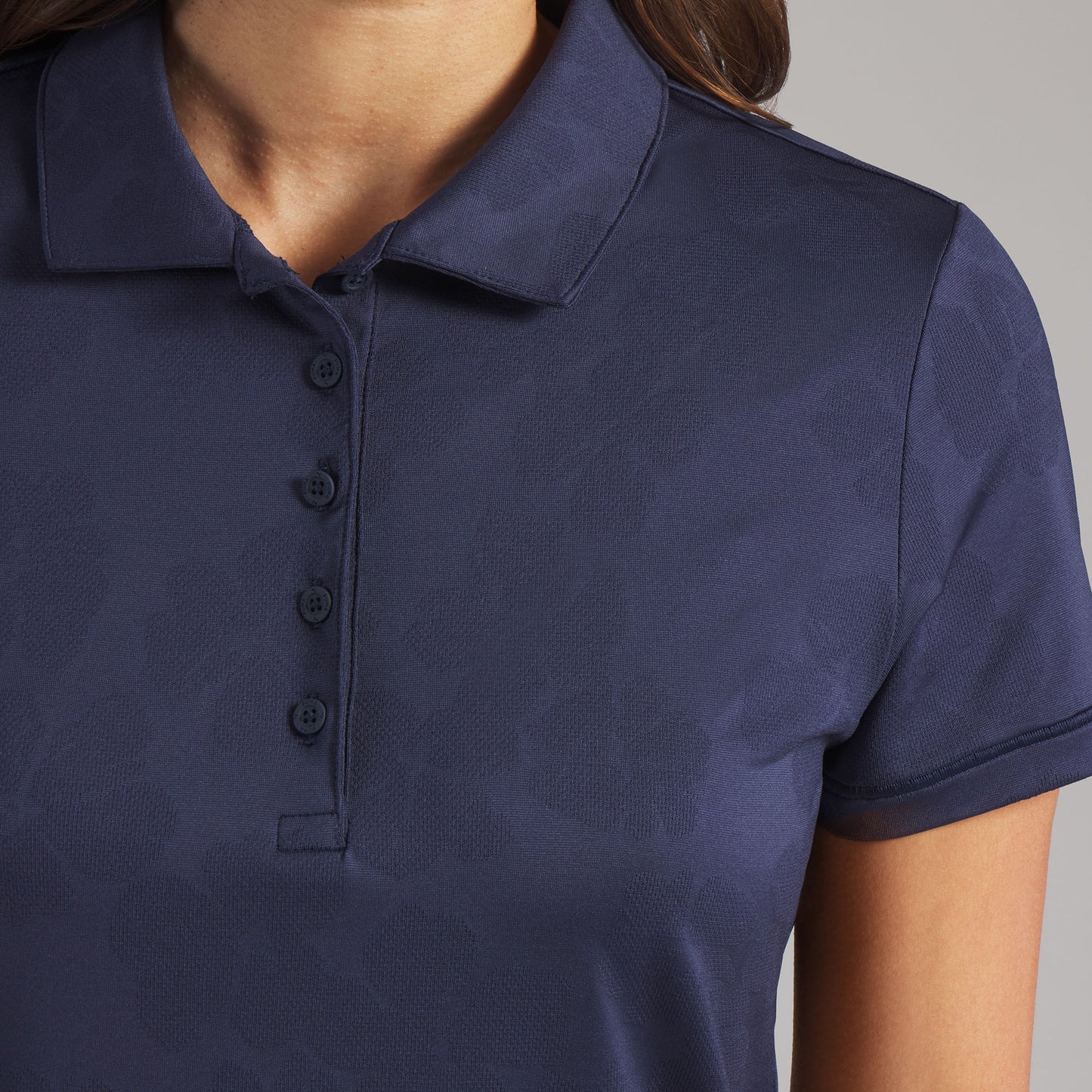 Puma Golf Ladies Short Sleeve Polo with Elegant Floral Jaquard Detail in Navy