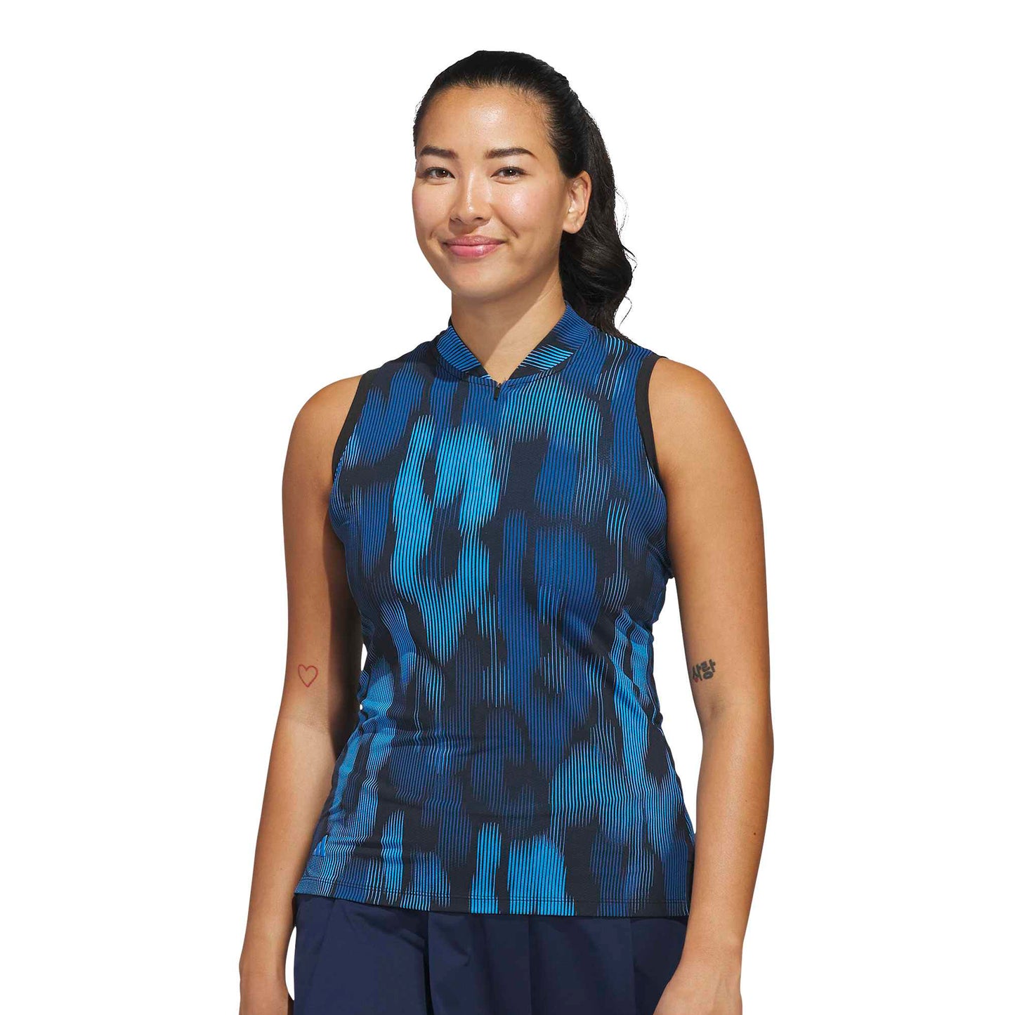 adidas Golf Ladies Sleeveless Polo in Striking Linear Leopard Print for Standout Style