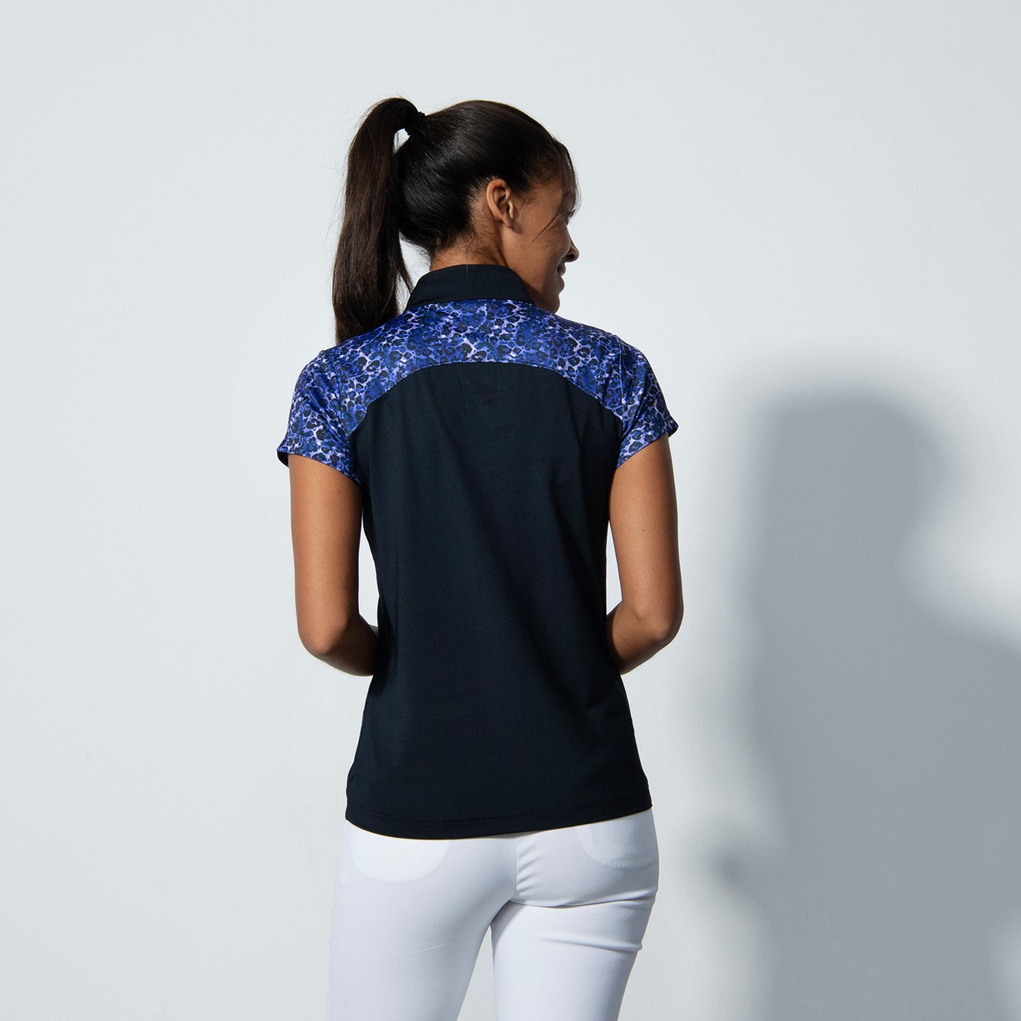 Daily Sports Ladies Cap Sleeve Polo in Dark Navy and Leopard Print