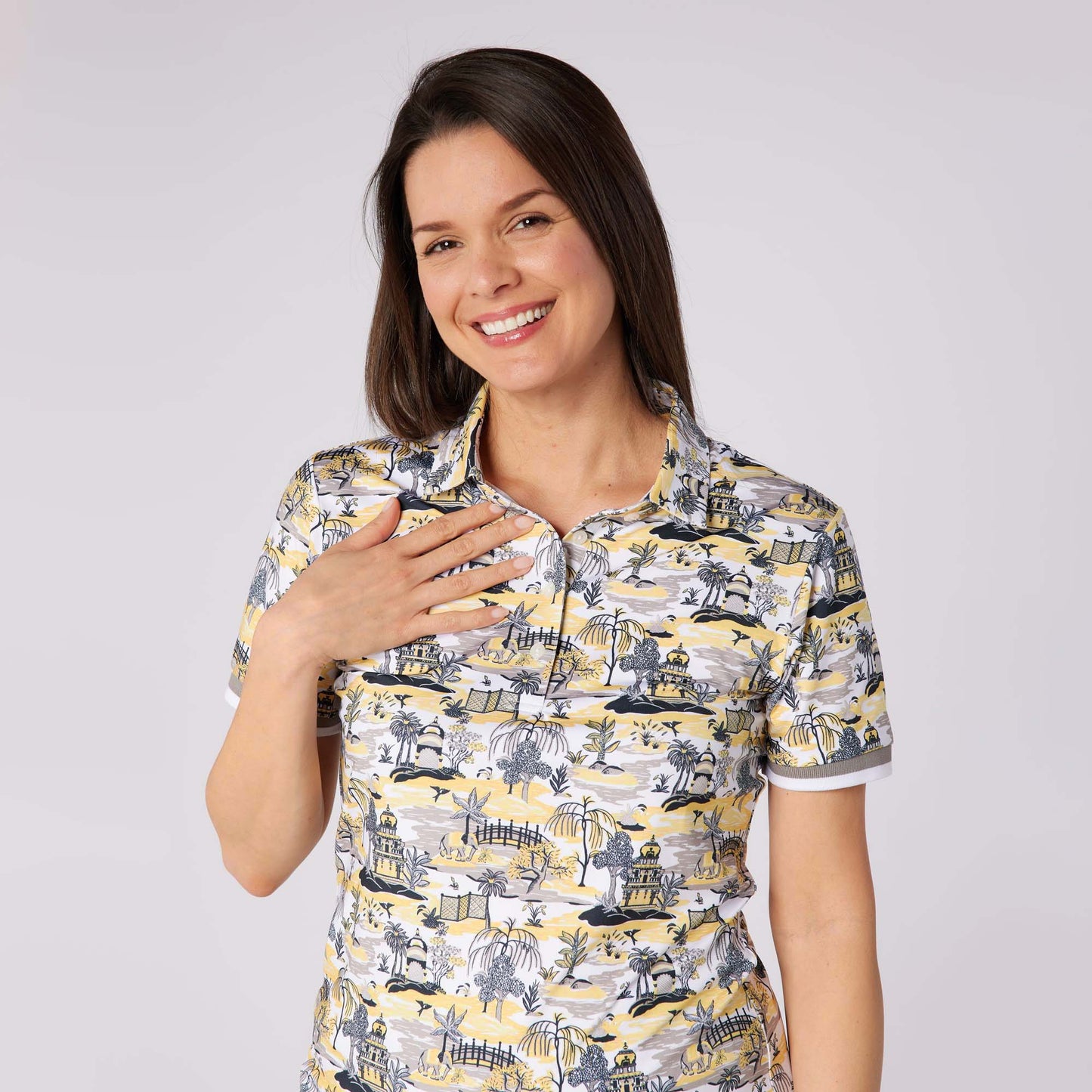 Swing Out Sister Ladies Ultra-Soft Short Sleeve Polo with Head Turning Print for All Day Style & Comfort