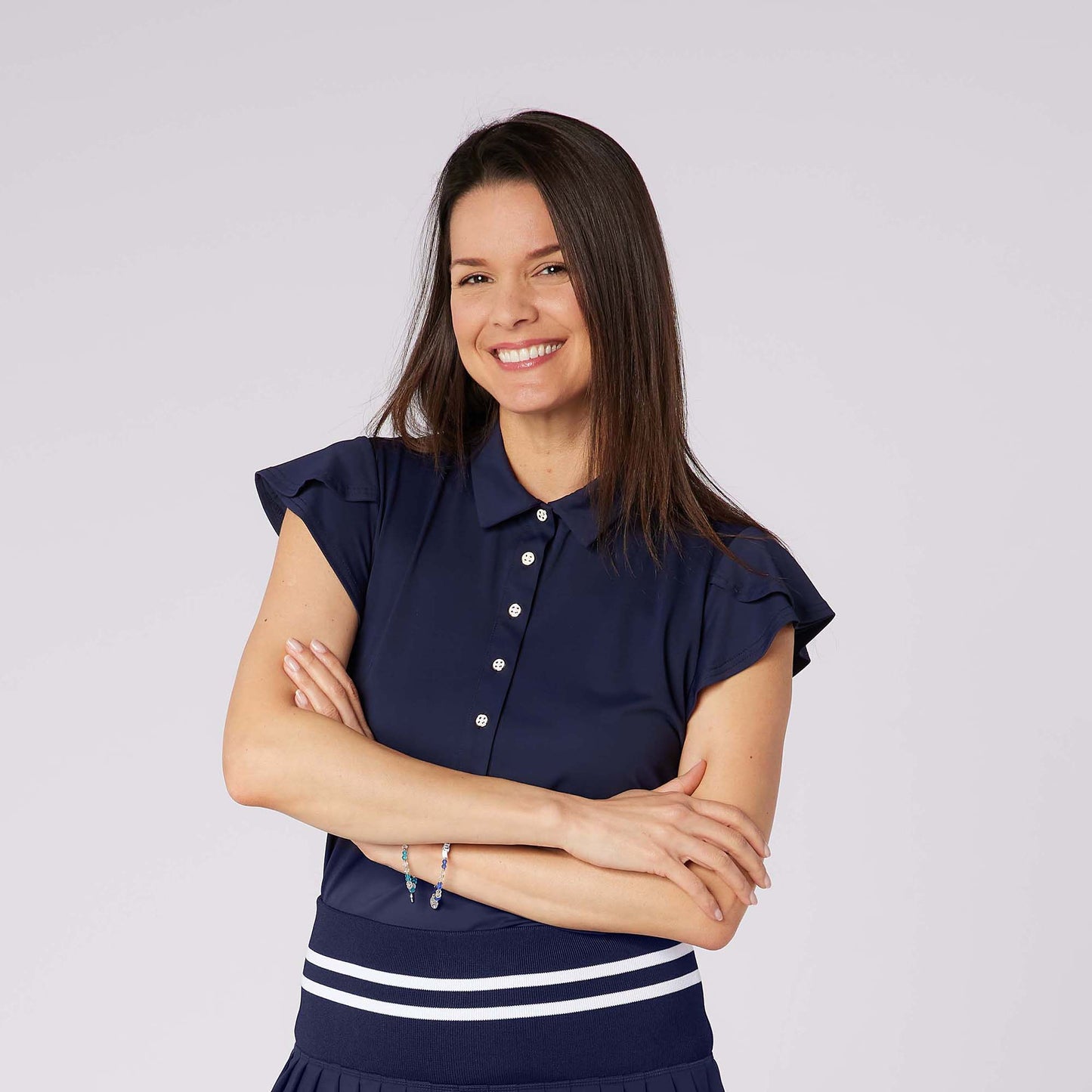 Swing Out Sister Ladies Fluted Sleeve Navy Polo for Elegant Flair On & Off The Course