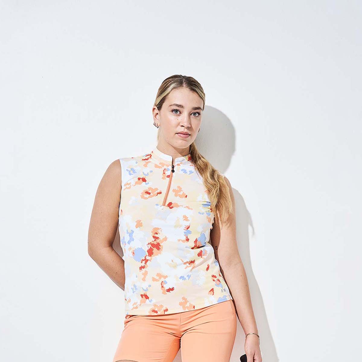 Nivo Ladies Sleeveless Polo in Multicoloured Abstract Camouflage Print