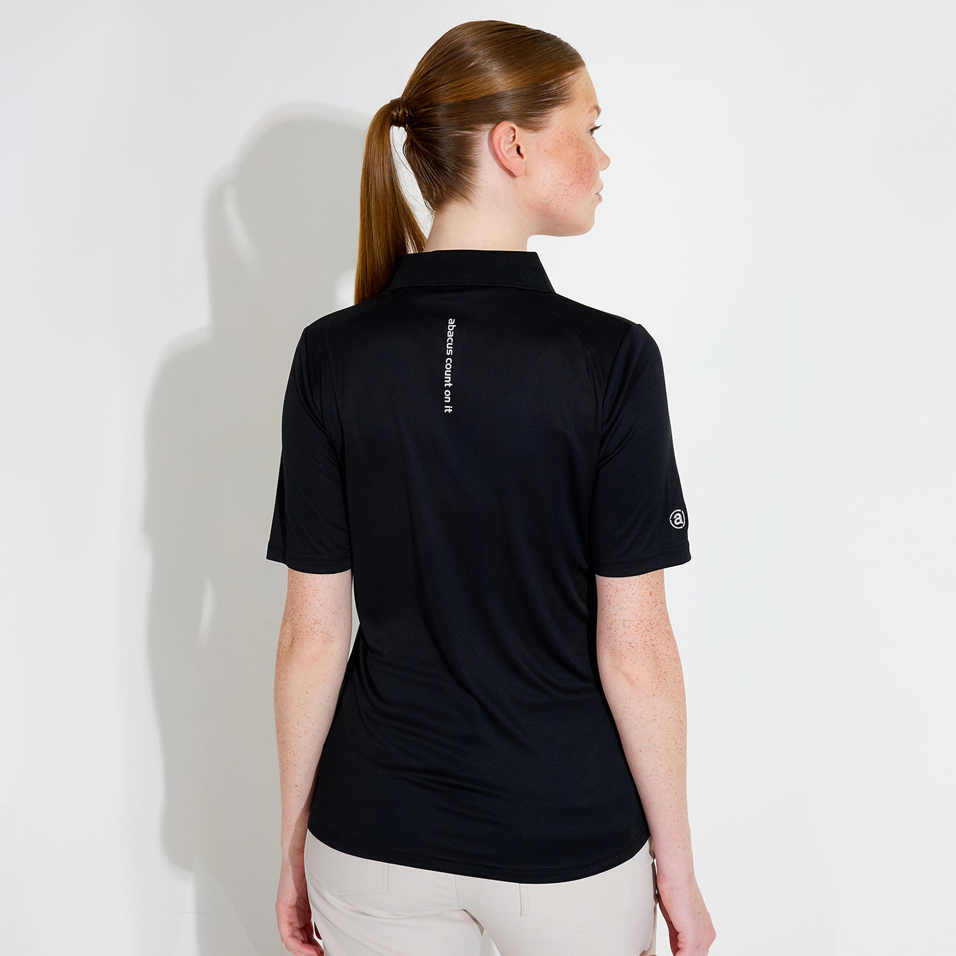 Abacus Ladies DryCool Half Sleeve Polo in Black - Chic Comfort on the Course