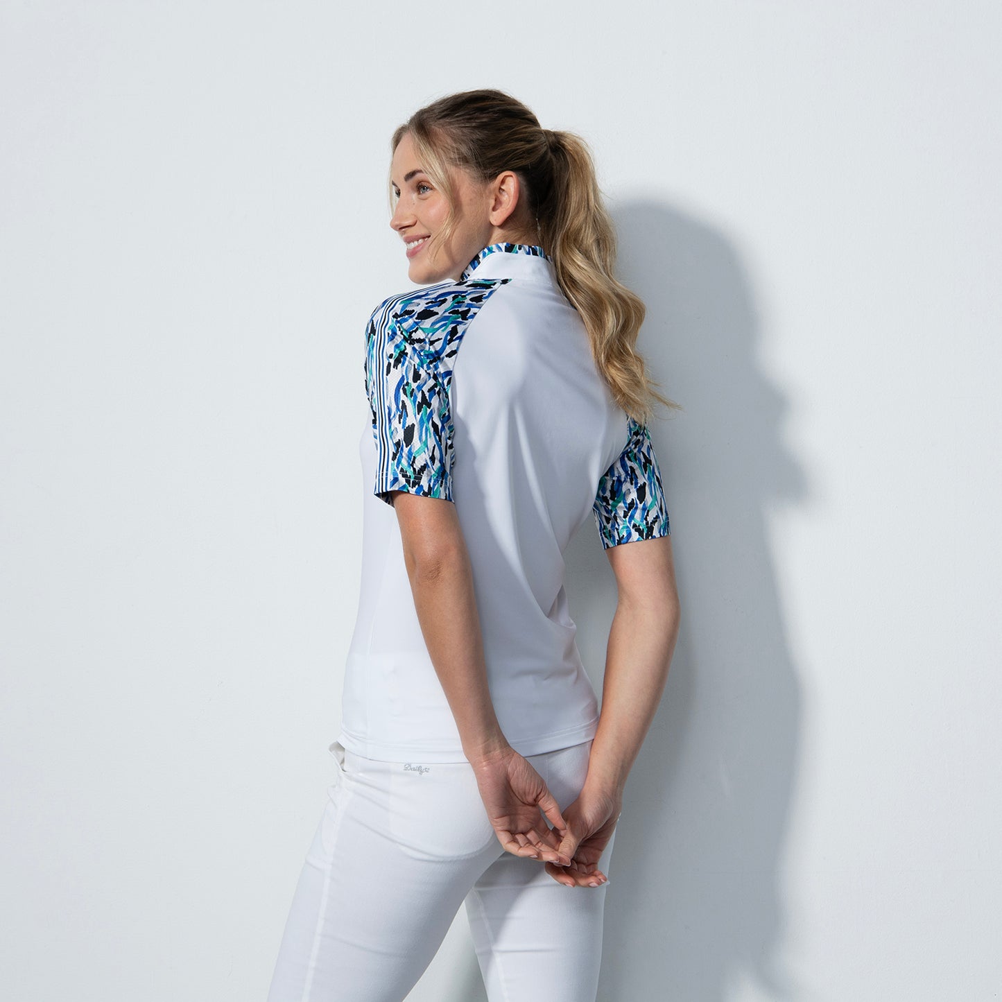 Daily Sports Ladies Half Sleeve Polo in White with Brushstroke Print Sleeves