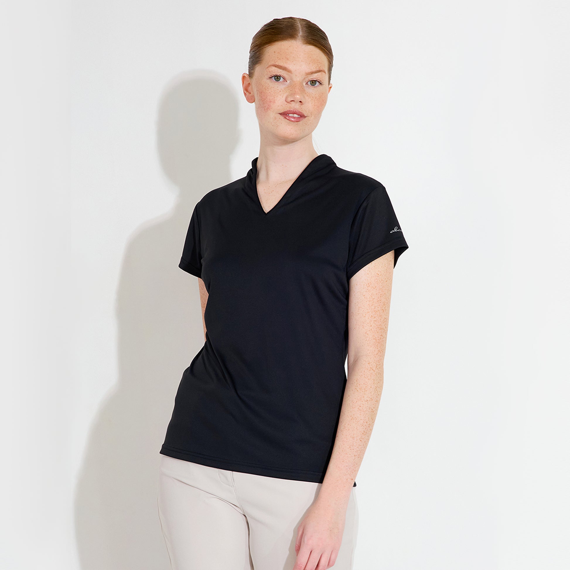 Abacus Ladies DryCool Cap Sleeve Polo in Black- Soft, Stretch