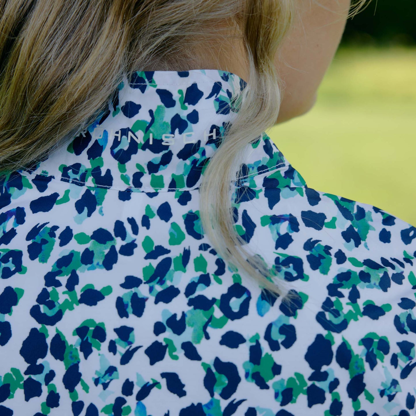 Röhnisch Ladies Elegant Zip Neck Stretch Top for Effortless Movement with Every Swing
