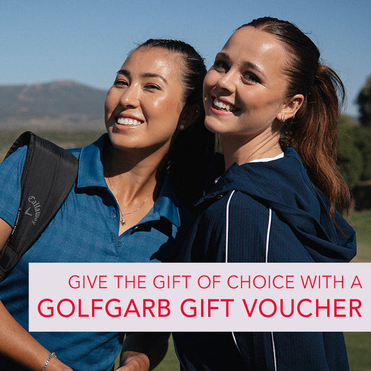 Image of two golfers wearing adidas golf women's polo and hoodie, the graphic promoting Gift Vouchers from GolfGarb
