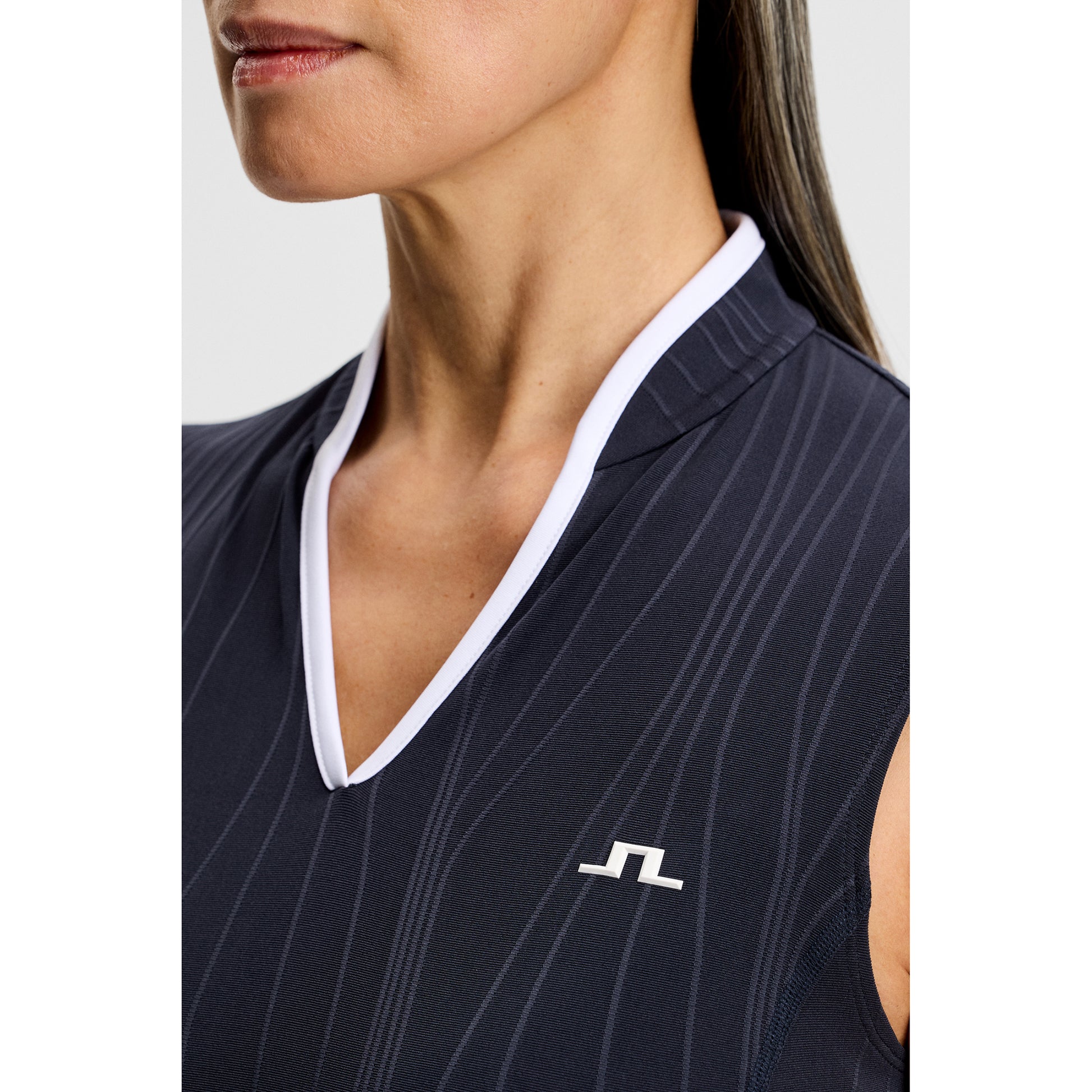 J.Lindeberg Ladies Navy Sleeveless Polo for Elevated Style & Unmatched Comfort