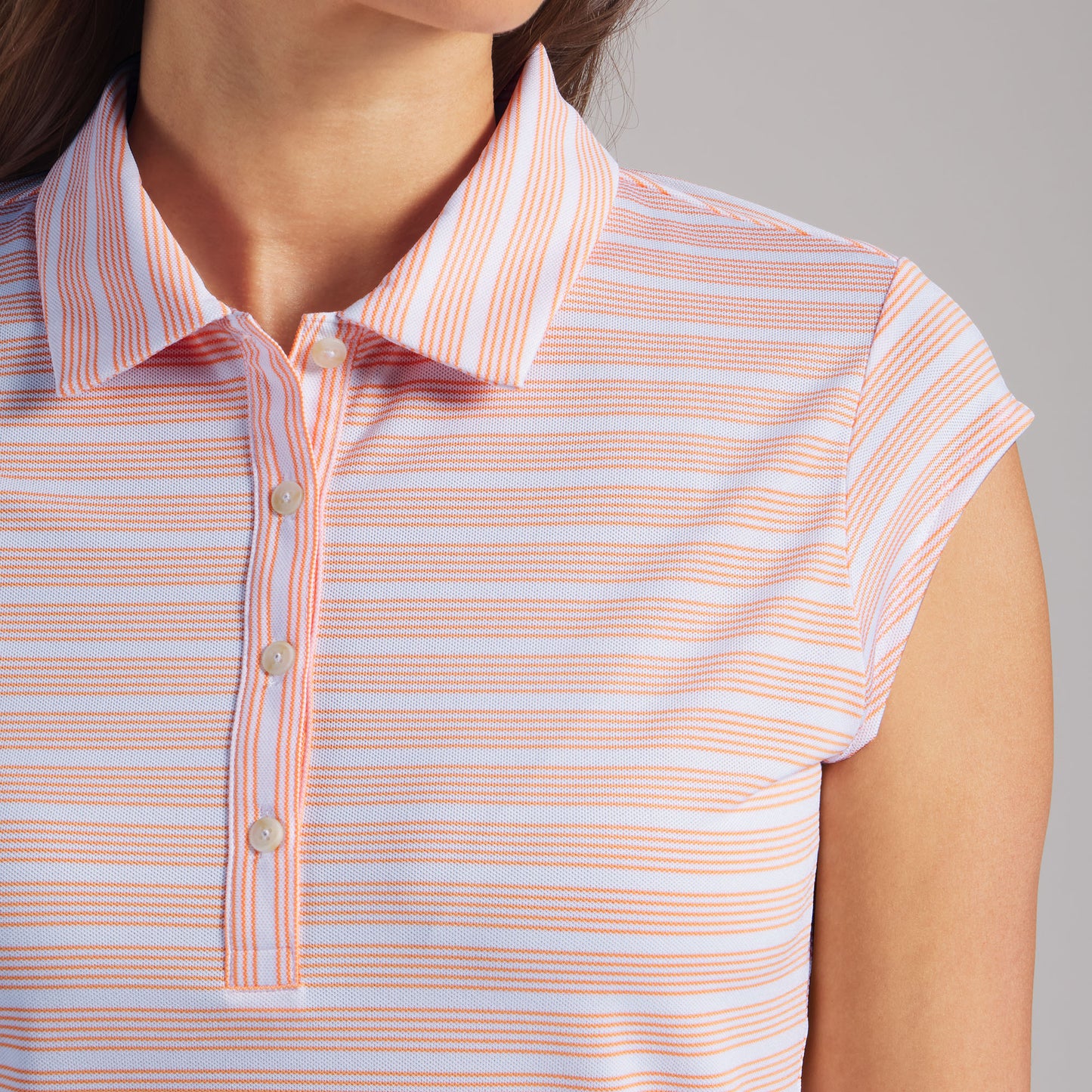 Puma Golf Ladies Pique Stripe Polo with Pretty Cap Sleeves for a Feminine Finish