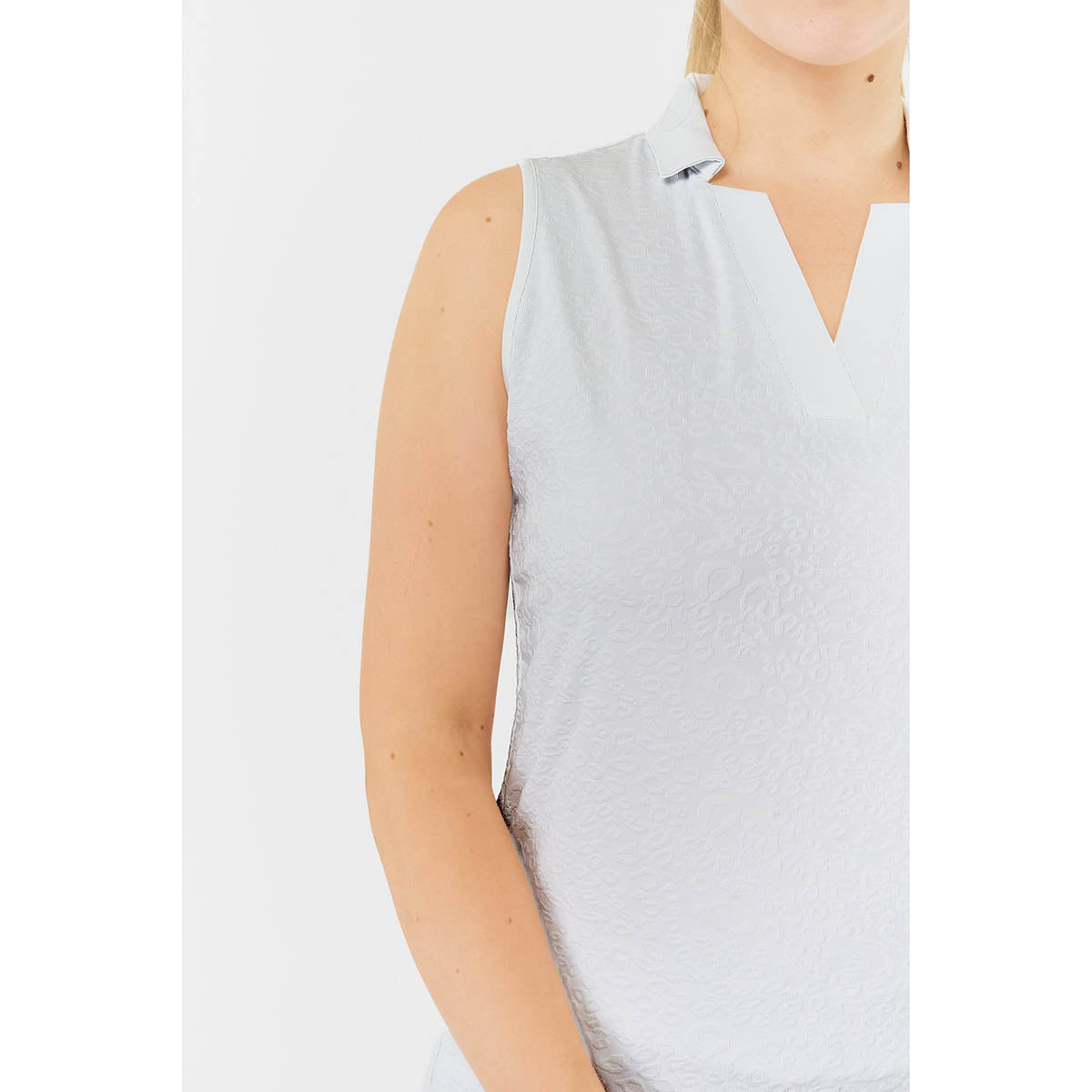 Pure Ladies Jacquard Print Sleeveless Polo with V-Neck Opening 