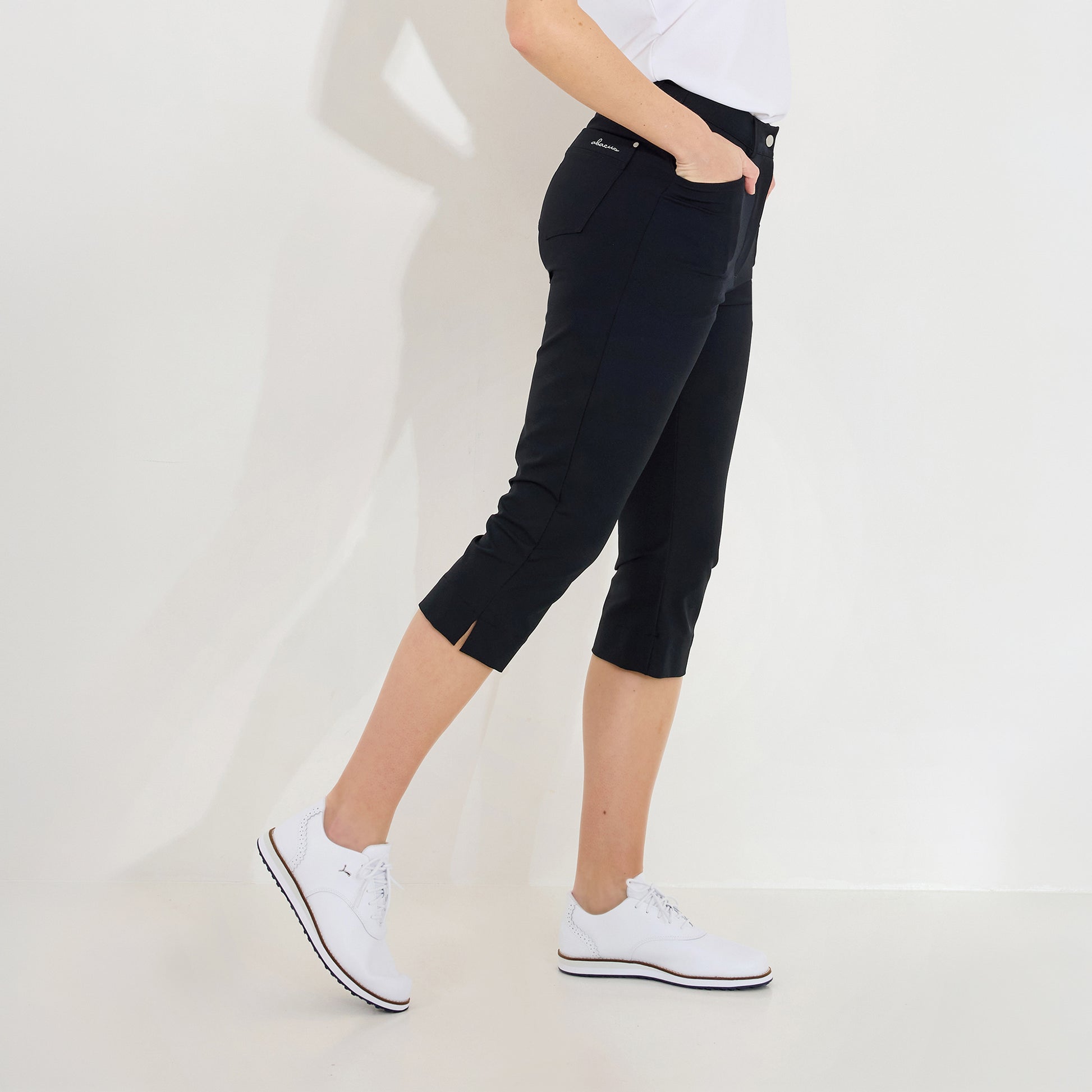 Abacus Ladies Capris in Black - Refined Comfort for On & Off the Course