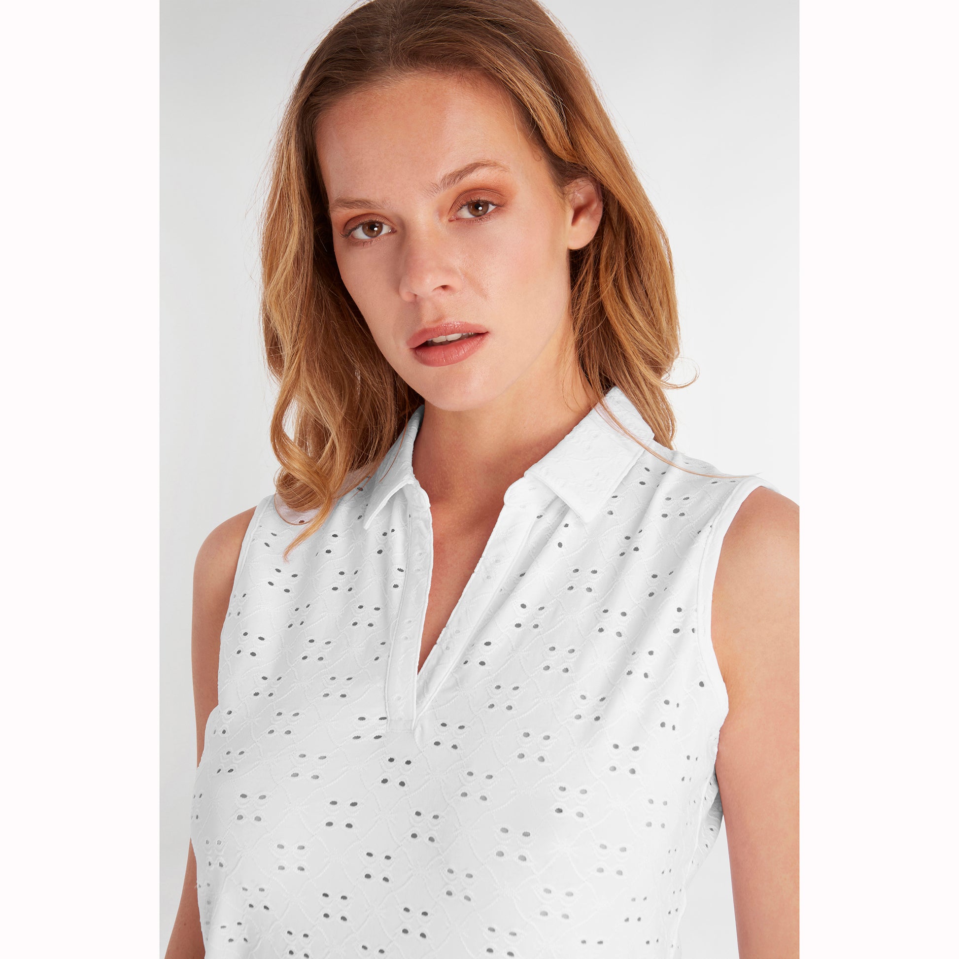 Green Lamb Ladies Sleeveless Polo with Broderie Anglaise Pattern in White