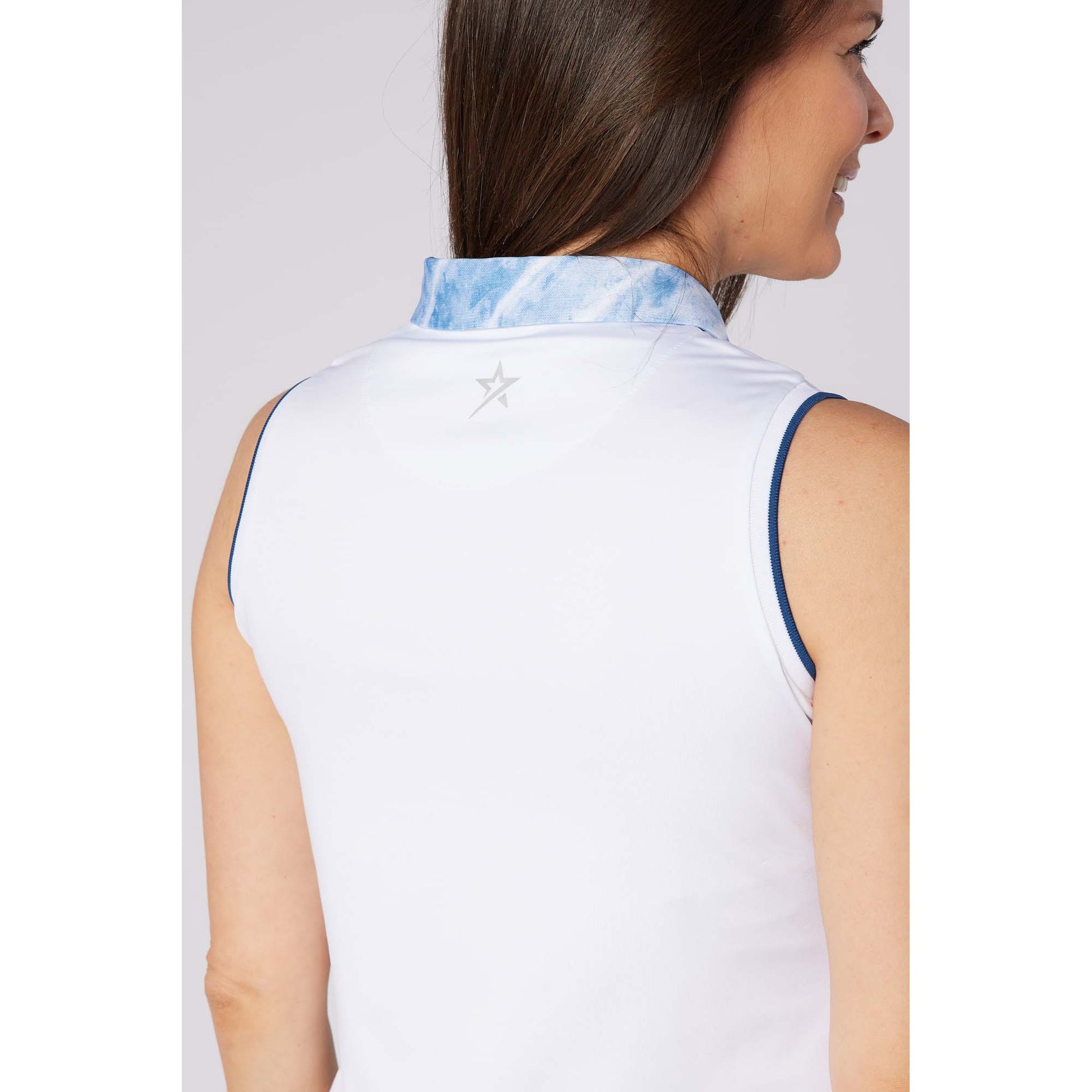 Swing Out Sister Ladies Sleeveless Polo with Subtle Print Accents for Effortless Everyday Style