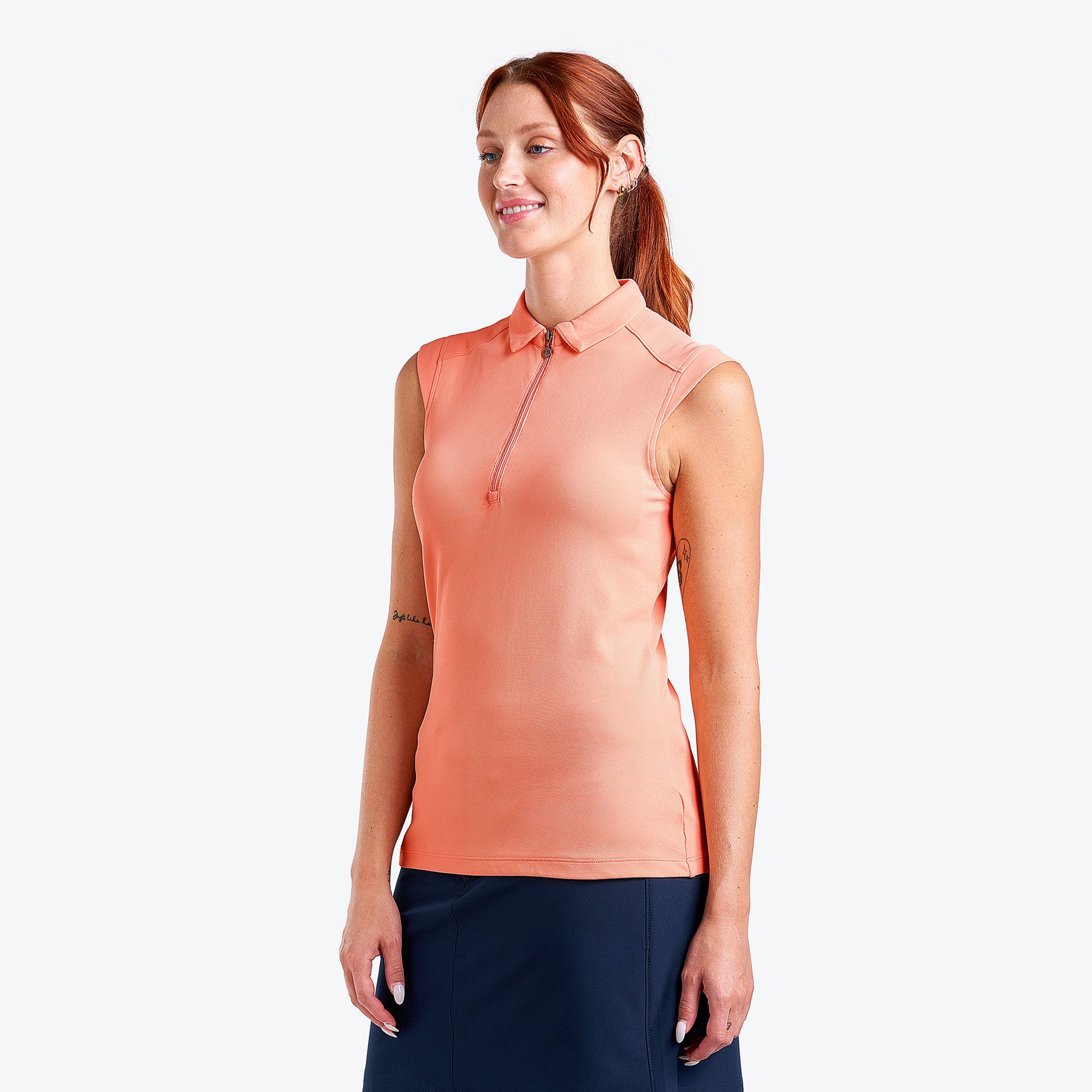 Nivo Ladies Sleeveless Piqué Polo with UPF 50+ in Coral Reef