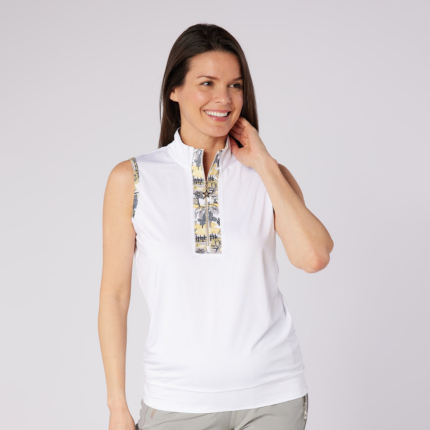 Swing Out Sister Ladies Sleeveless Polo With The Perfect Pop Of Print for Subtle Style