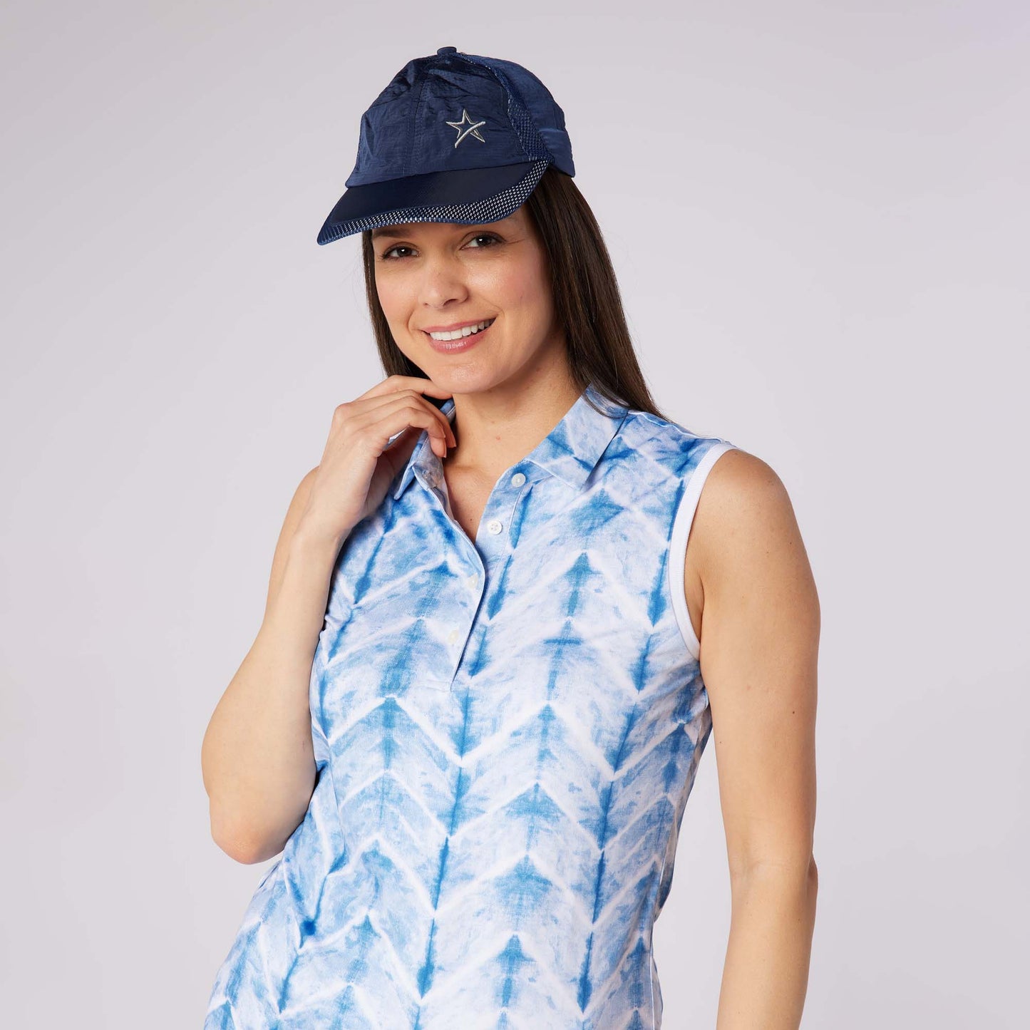 Swing Out Sister Ladies Ultra-Soft Sleeveless Polo with Head Turning Print & Stylish Contrast Trim