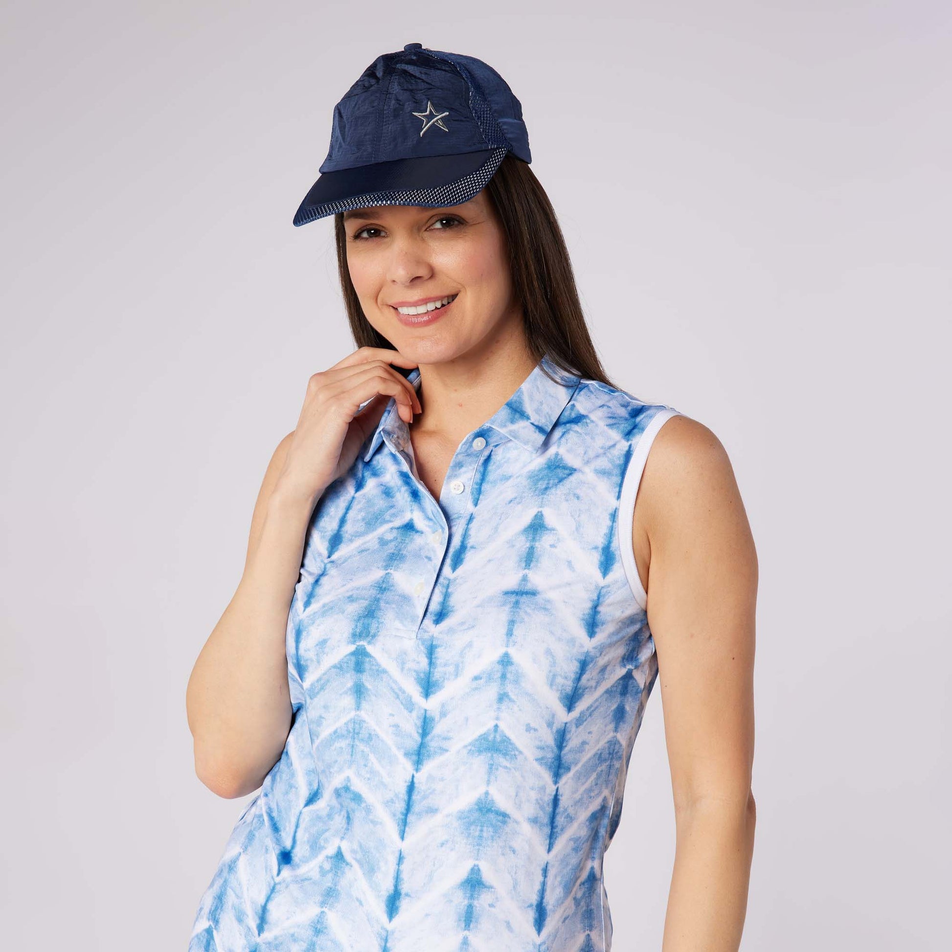 Swing Out Sister Ladies Ultra-Soft Sleeveless Polo with Head Turning Print & Stylish Contrast Trim