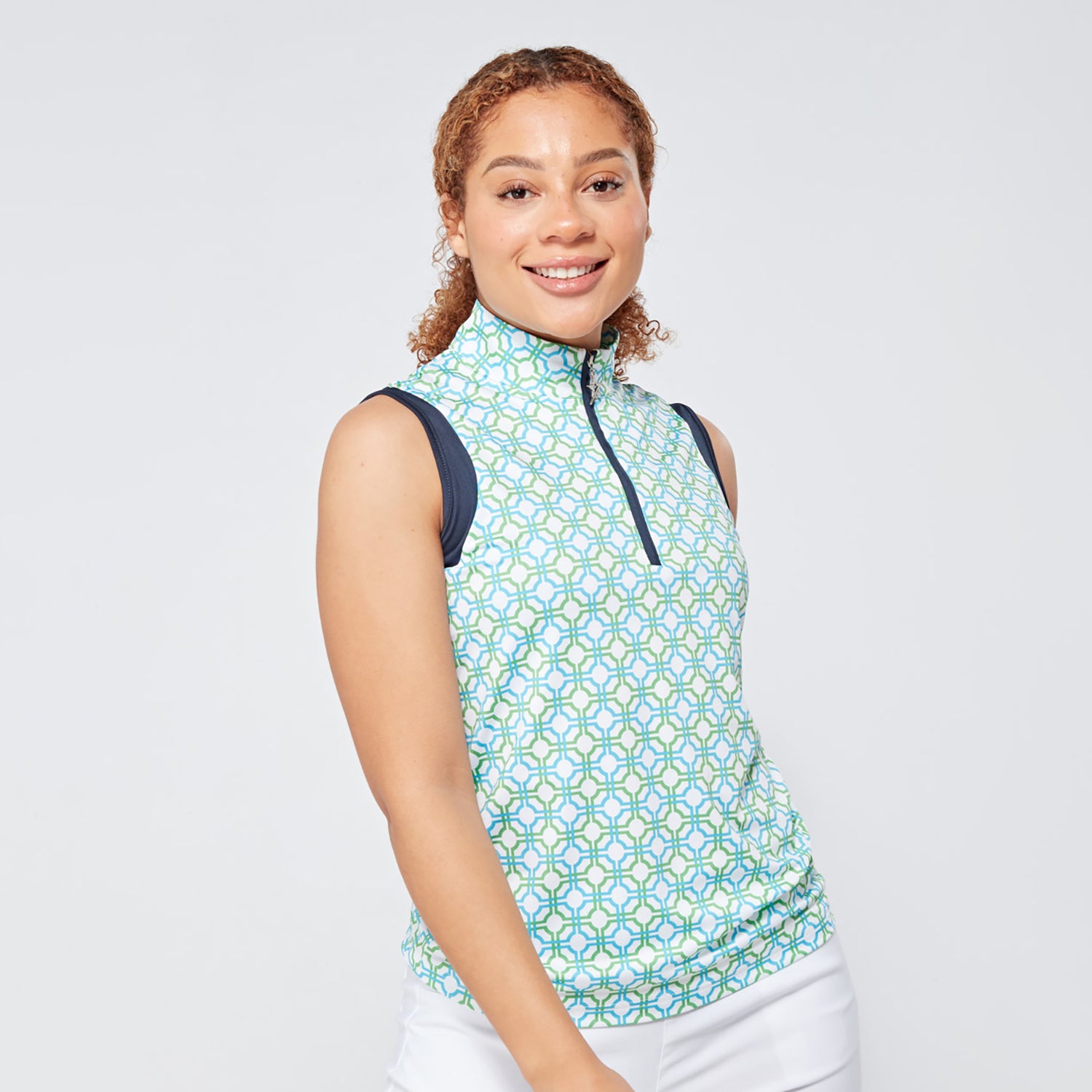 Swing Out Sister Ladies Sleeveless Zip-Neck Polo in Dazzling Blue and Emerald Mosaic Pattern