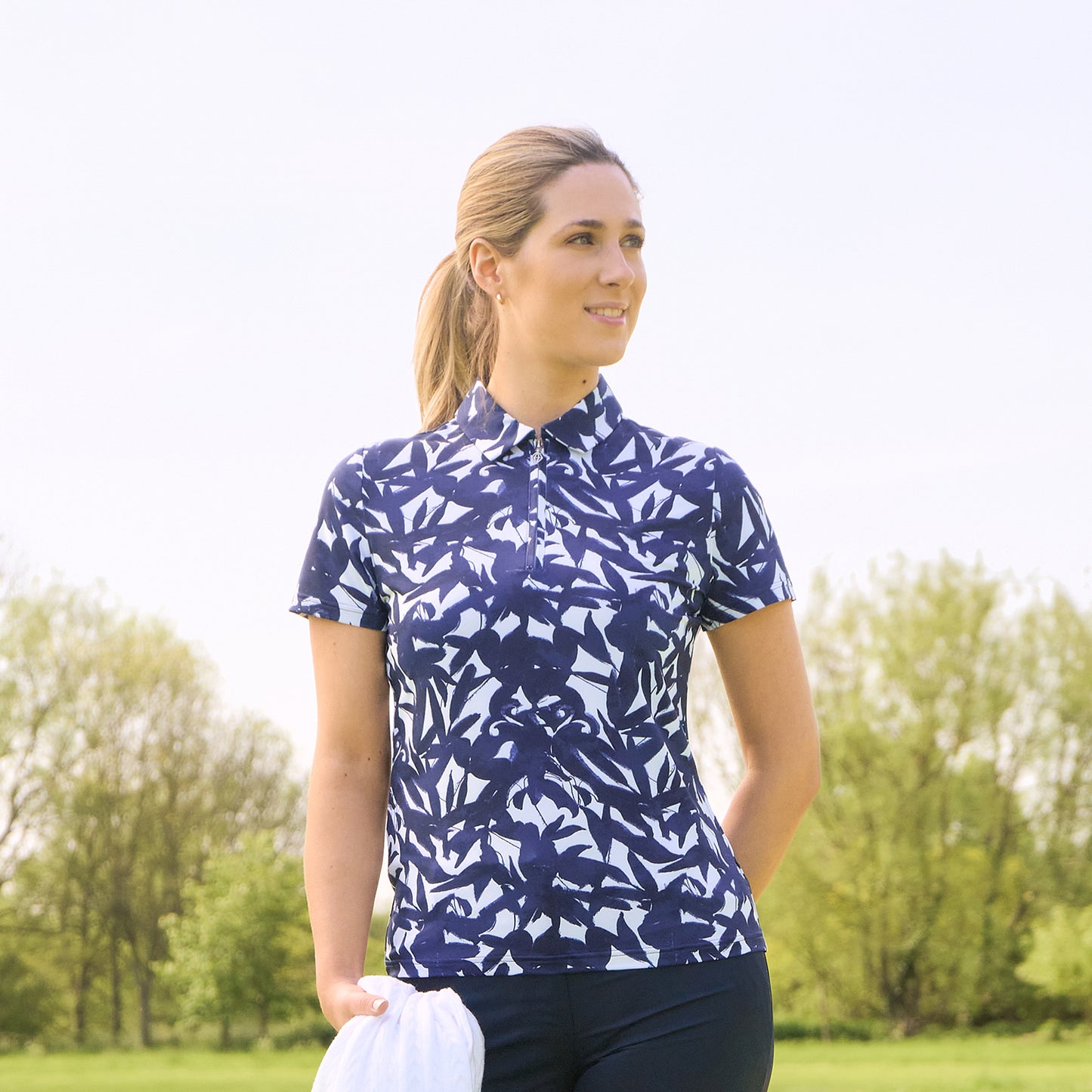 Pure Golf Ladies Short Sleeve Polo in Botanical Navy Print