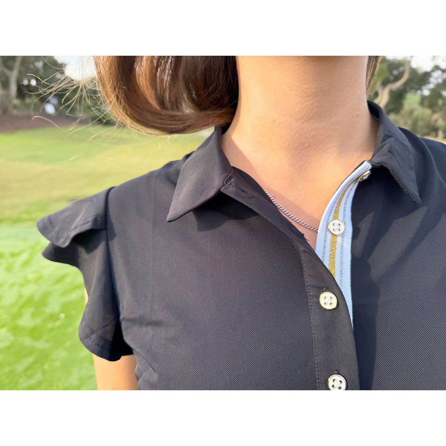 Swing Out Sister Ladies Fluted Cap Sleeve Polo in Black