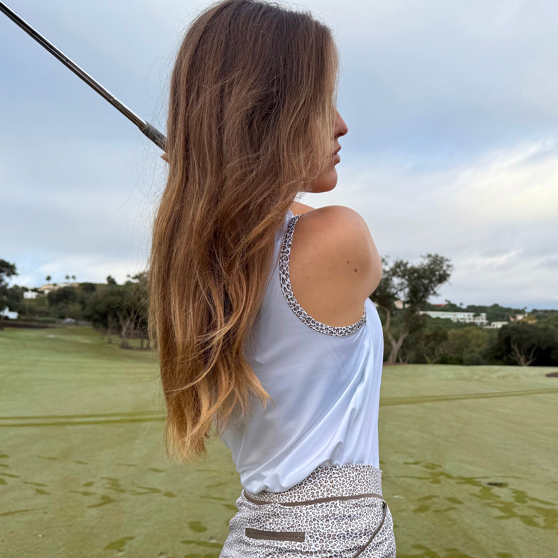 Swing Out Sister Ladies Zip-Neck Sleeveless Polo with Leopard Print Trim