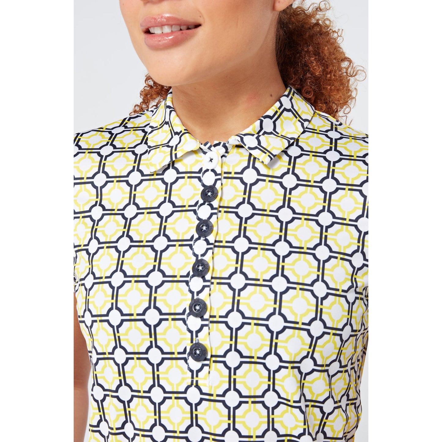 Swing Out Sister Ladies Cap Sleeve Polo in Sunshine and Navy Mosaic Pattern	