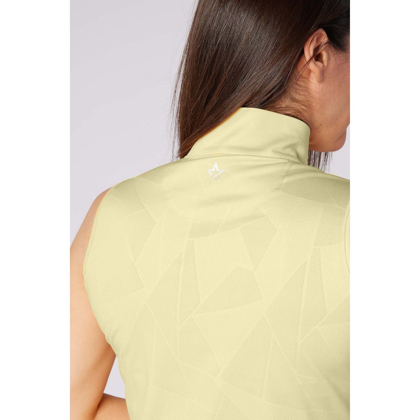 Swing Out Sister Elegant Embossed Ladies Sleeveless Polo with Zip Neck – A Stylish Staple for Every Season
