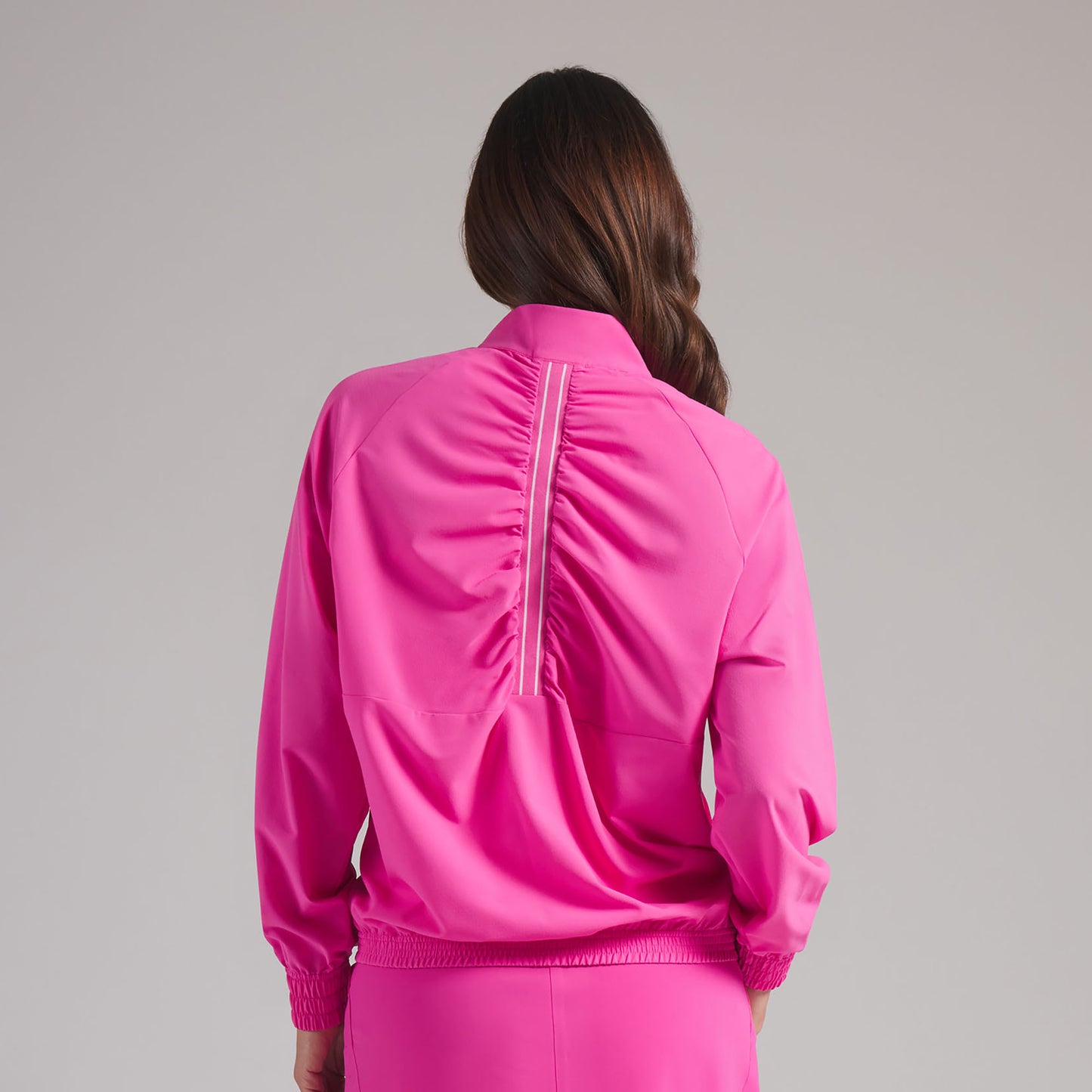 Puma Ladies Golf Wind Jacket Functional & Feminine with Swing Ready Back Detail