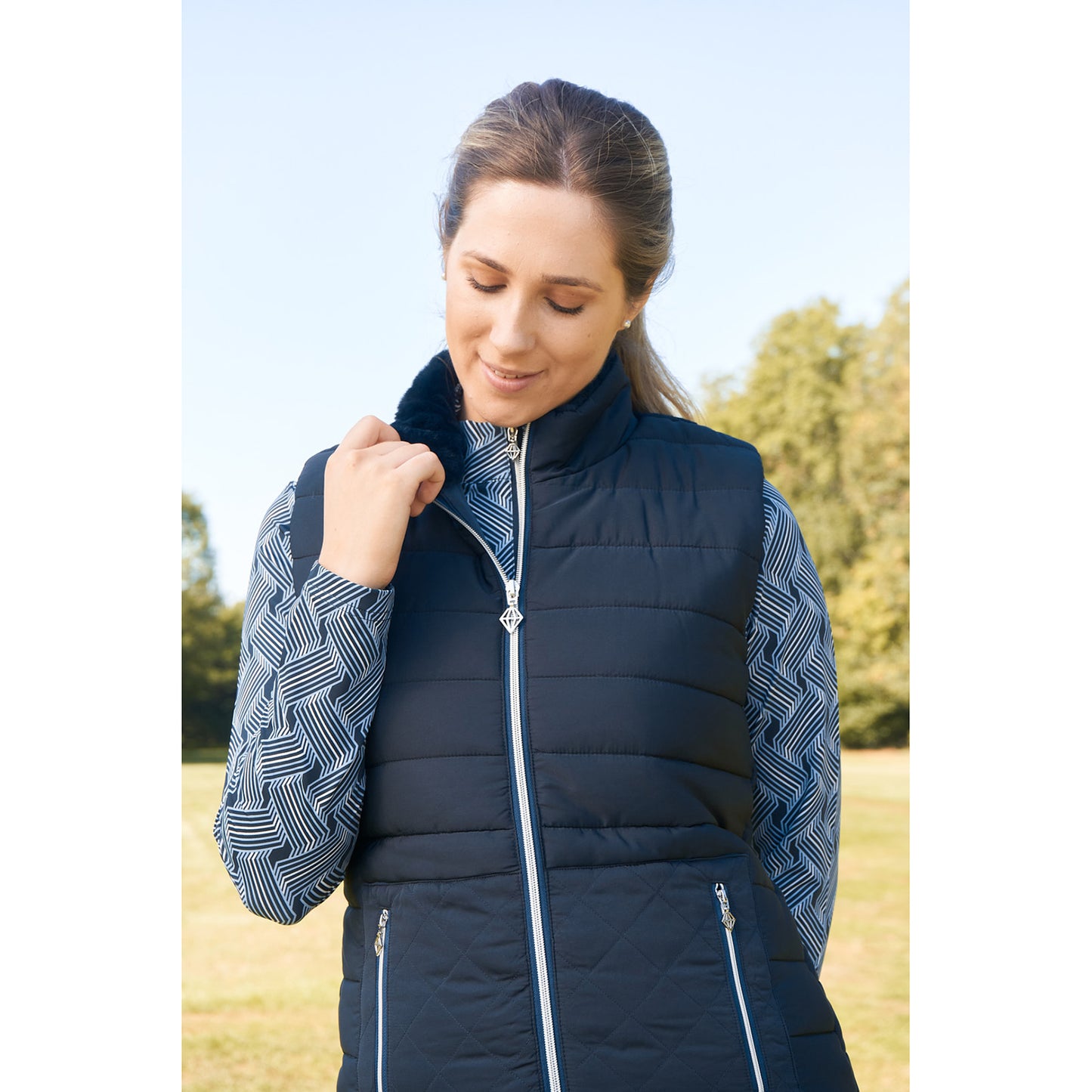 Pure Golf Ladies Gilet in Navy with Faux Fur Collar