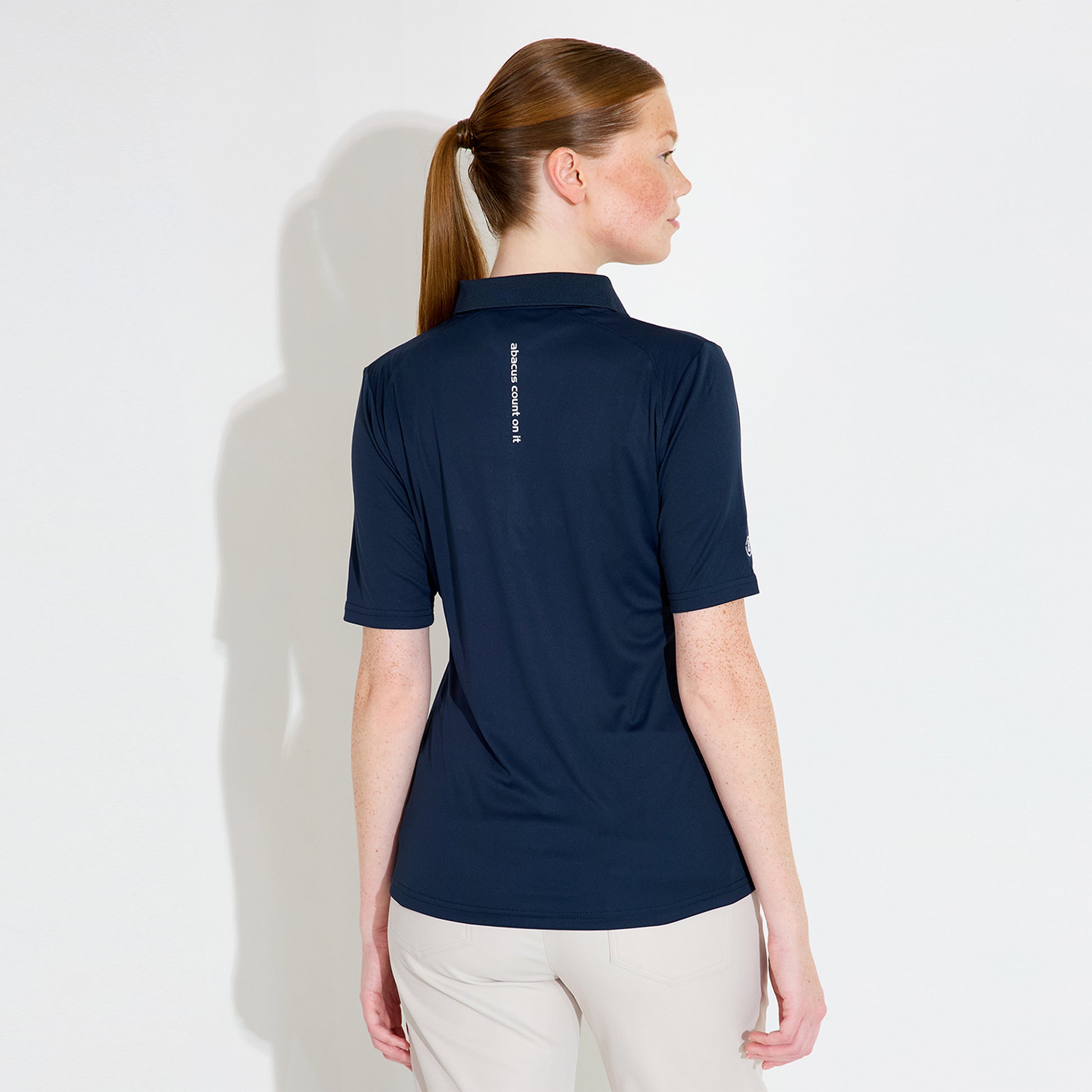 Abacus Ladies DryCool Half Sleeve Polo in Navy - Chic Comfort on the Course