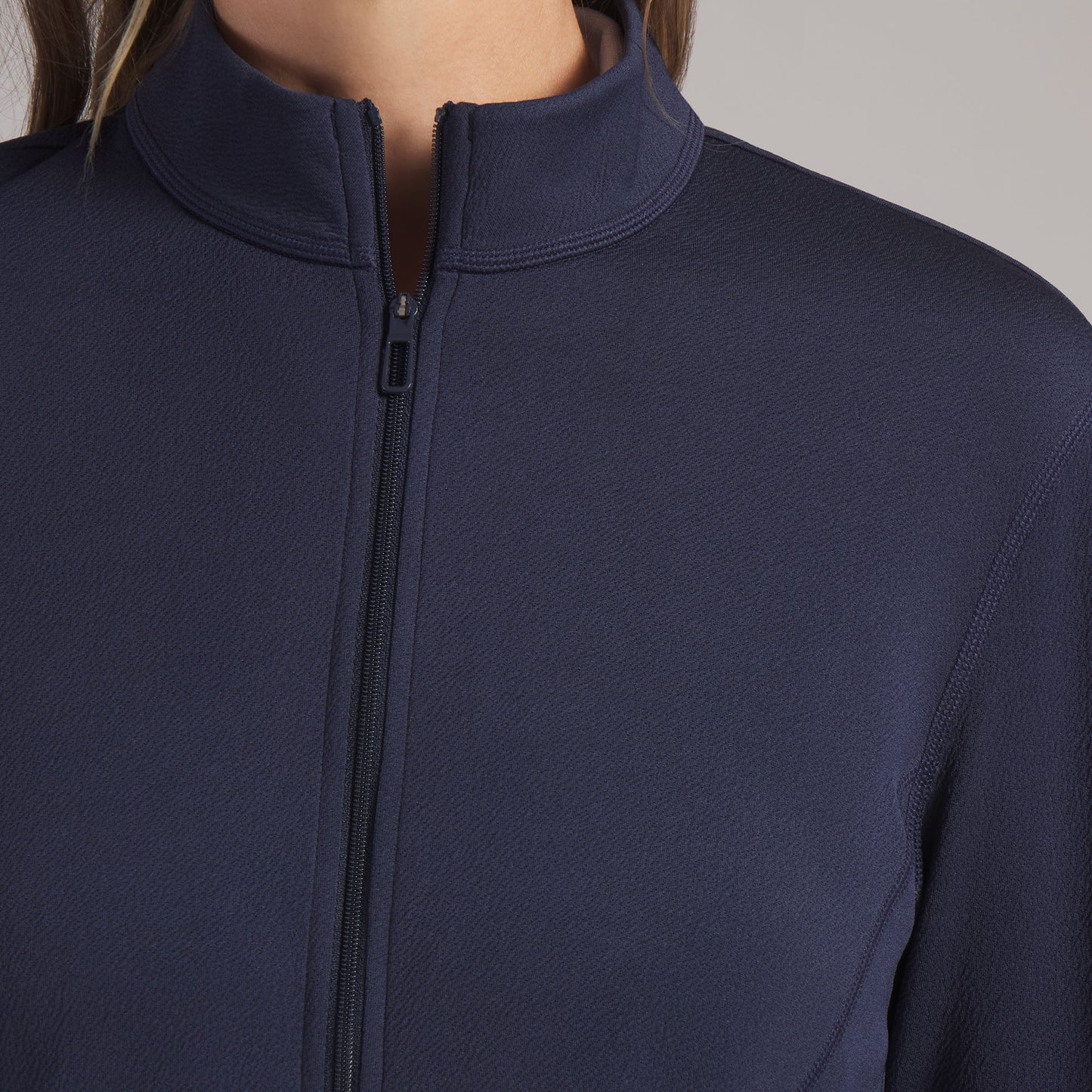Puma Golf Ladies Navy Full-Zip Jacket with Textured Stretch Comfort for Effortless Movement