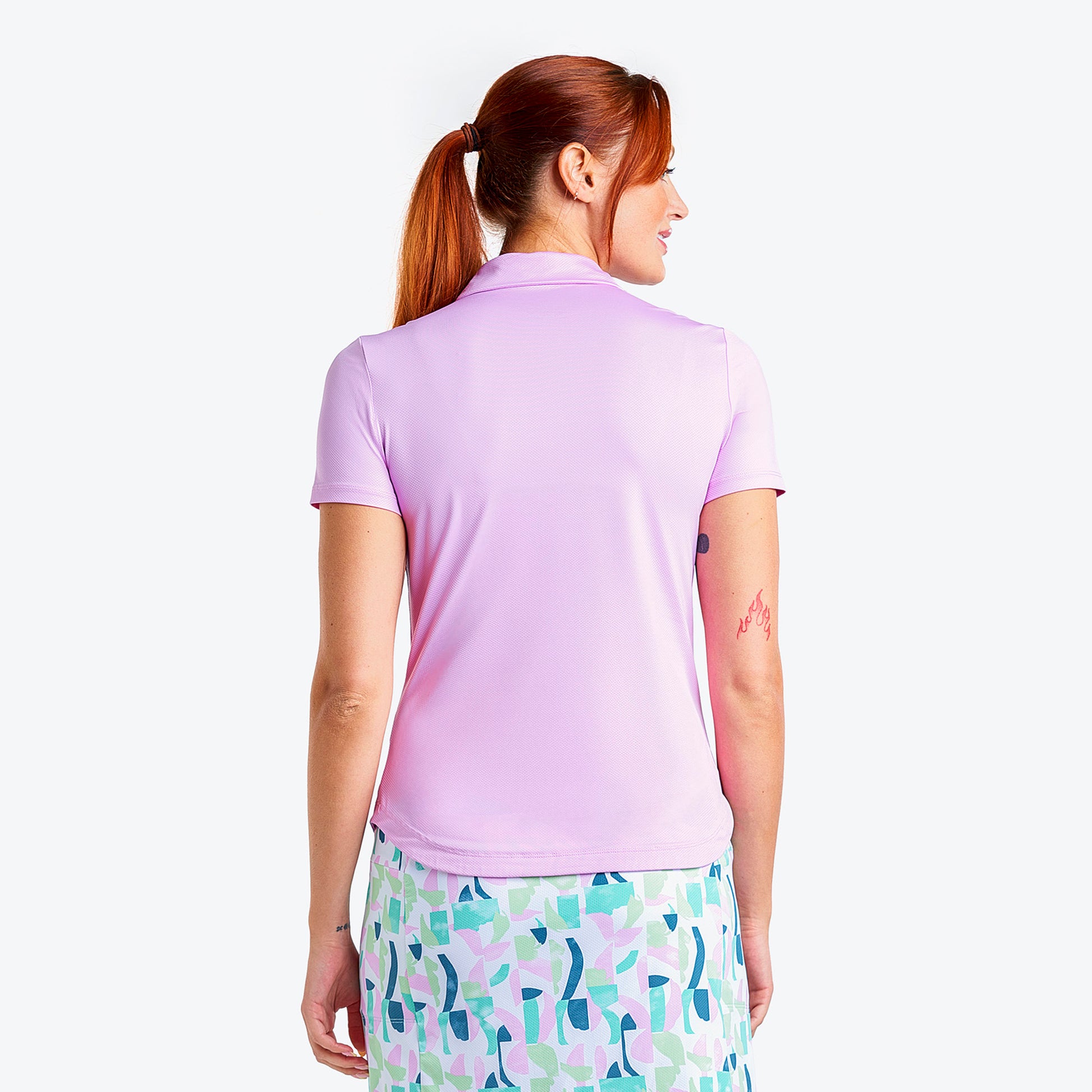 Nivo Ladies Short Sleeve Polo with UPF50 in Bubble Gum
