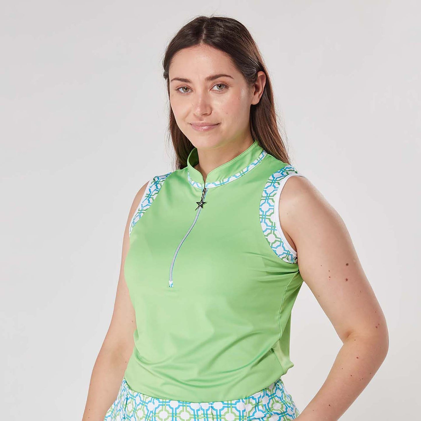 Swing Out Sister Ladies Sleeveless Print Polo in Dazzling Blue and Emerald with Zip-Neck