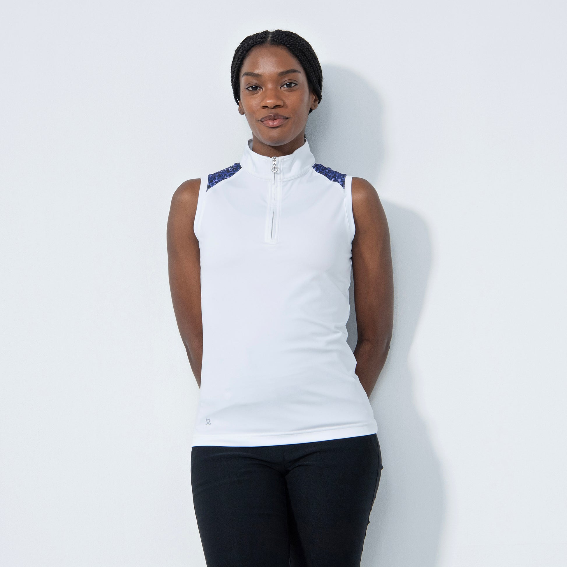 Daily Sports Ladies Sleeveless Half-Neck Polo in White and Leopard Print