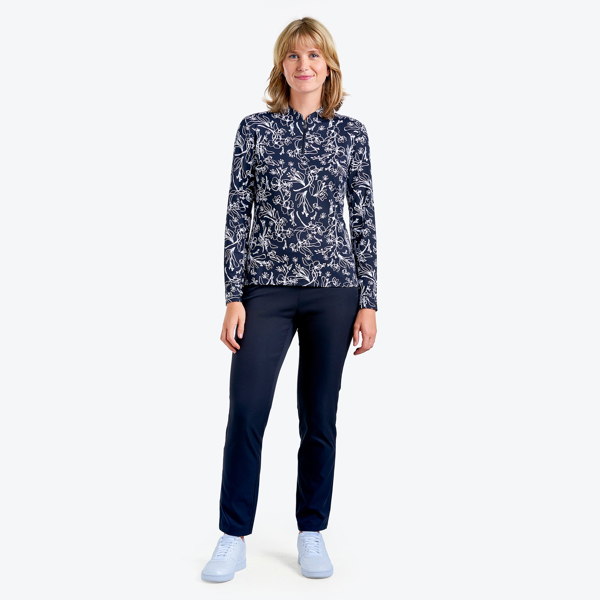 Nivo Ladies Long Sleeve Golf Polo in Black & White Abstract Floral Print 