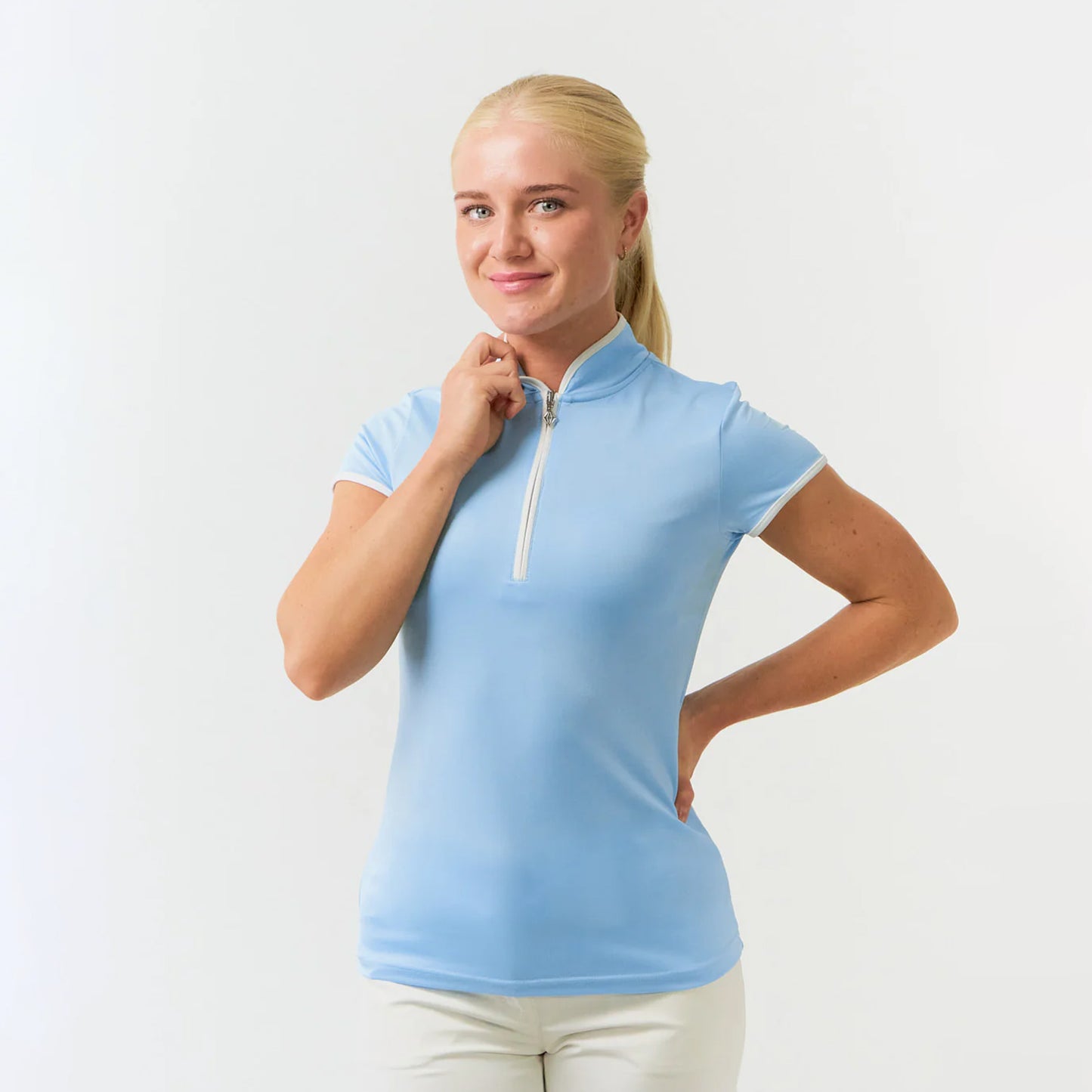Pure Golf Ladies Cap Sleeve Mandarin Polo Shirt in Pale Blue
