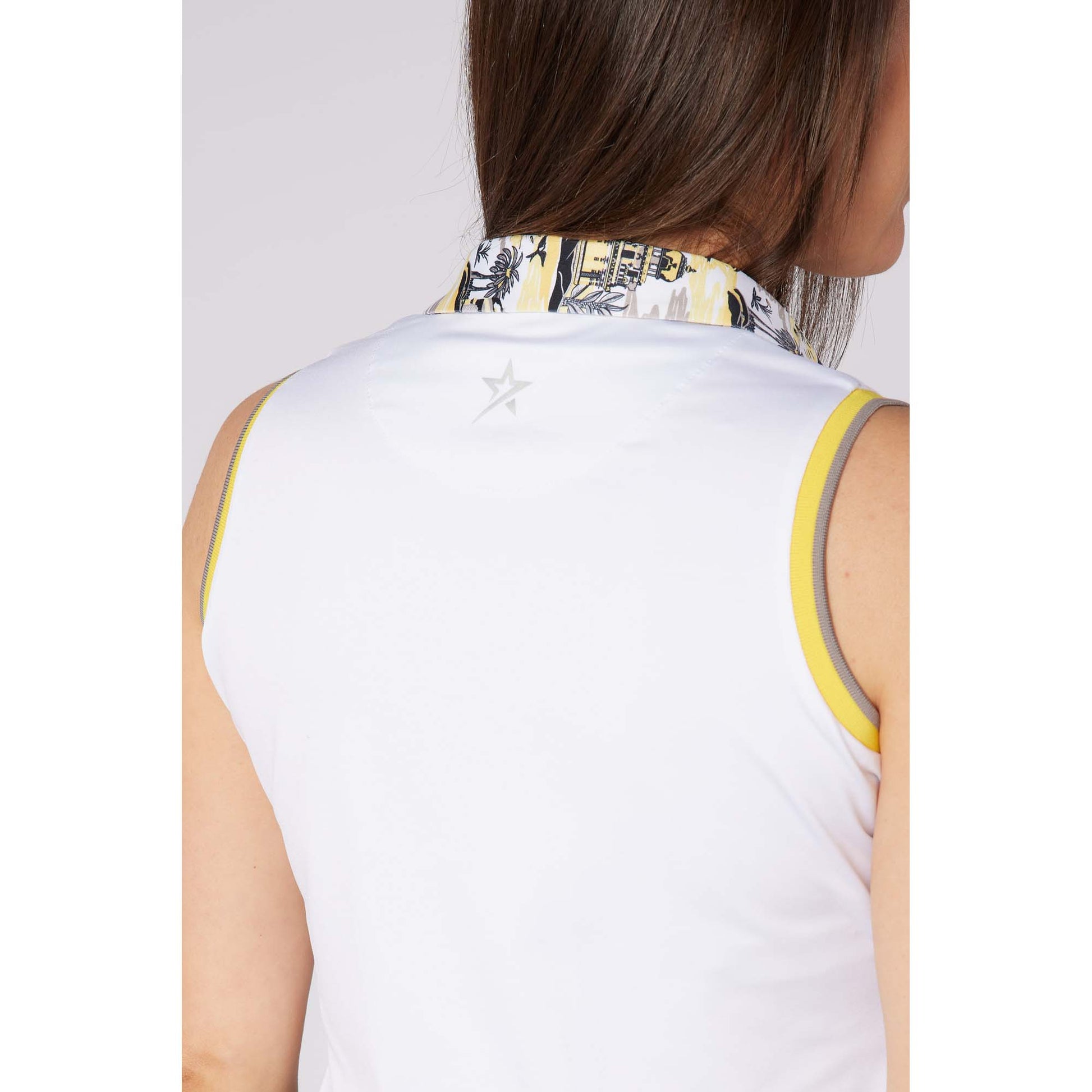 Swing Out Sister Ladies Sleeveless Polo with Subtle Print Accents for Effortless Everyday Style