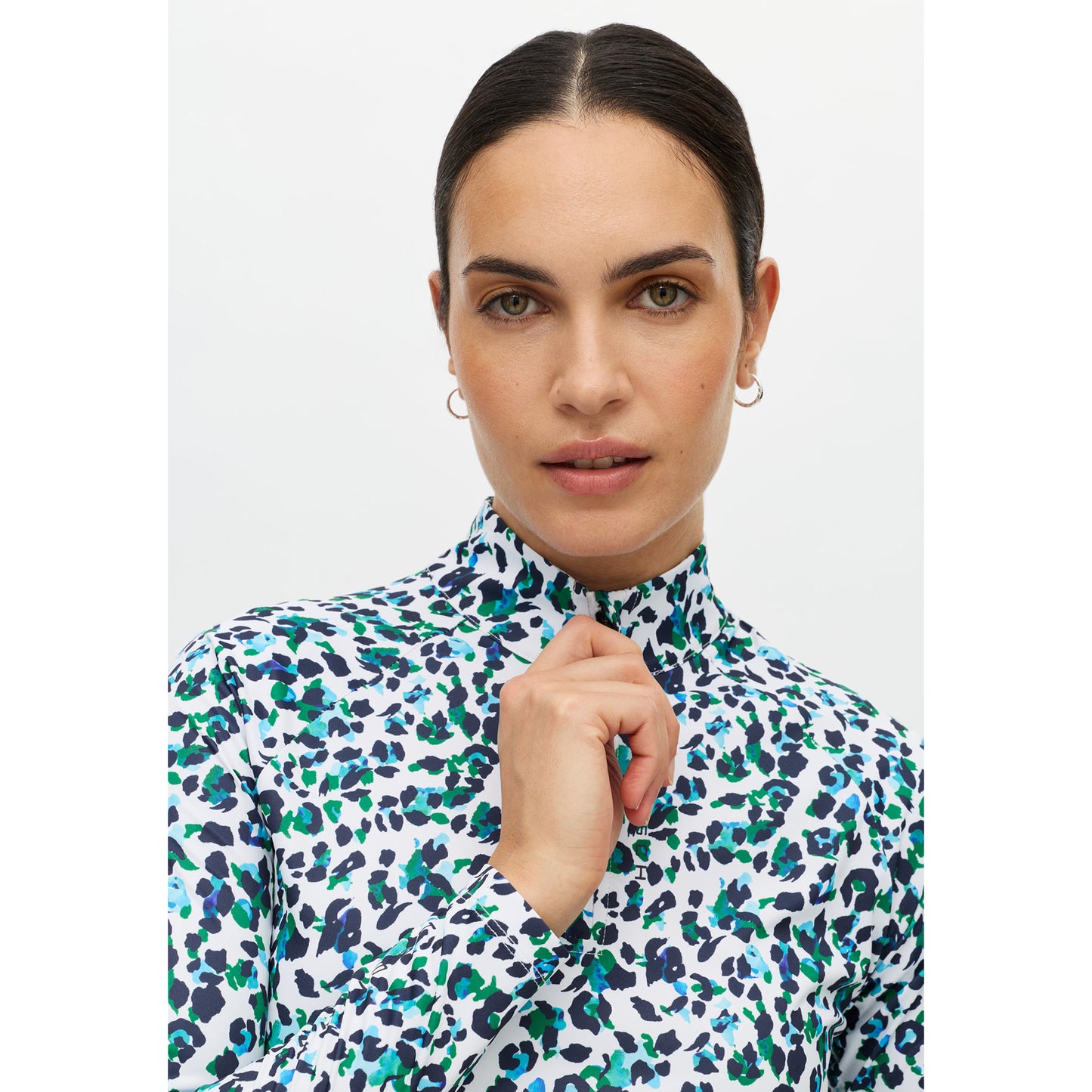 Röhnisch Ladies Elegant Zip Neck Stretch Top for Effortless Movement with Every Swing