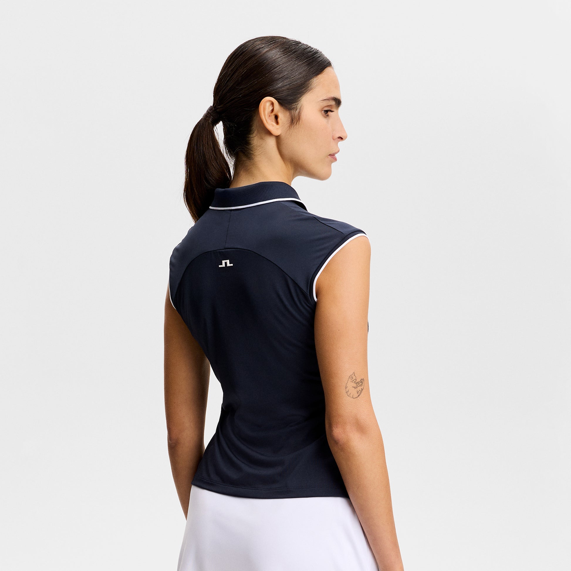 J.Lindeberg Ladies Navy Cap Sleeve Polo for Graceful Performance, On the Course & Beyond
