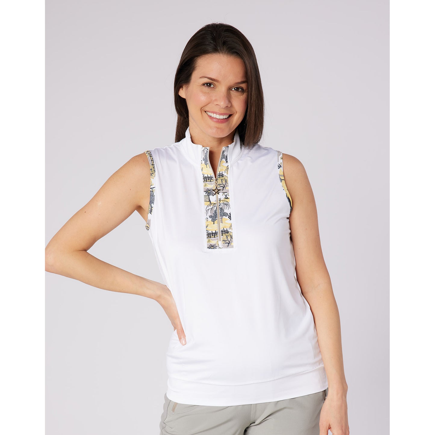 Swing Out Sister Ladies Sleeveless Polo With The Perfect Pop Of Print for Subtle Style